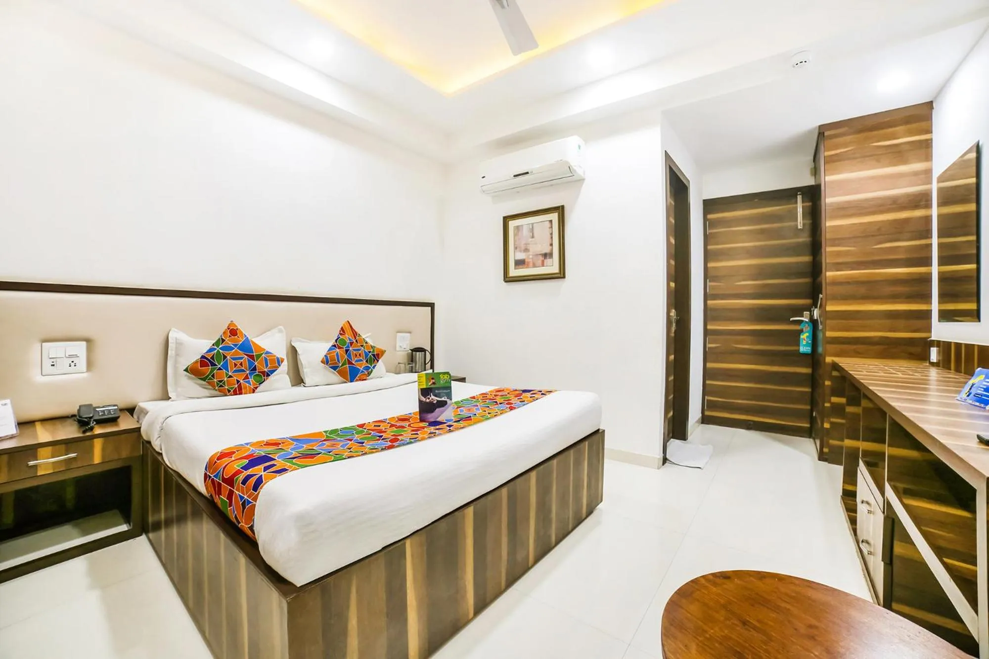 Bed in FabHotel Prime Sapphire Inn