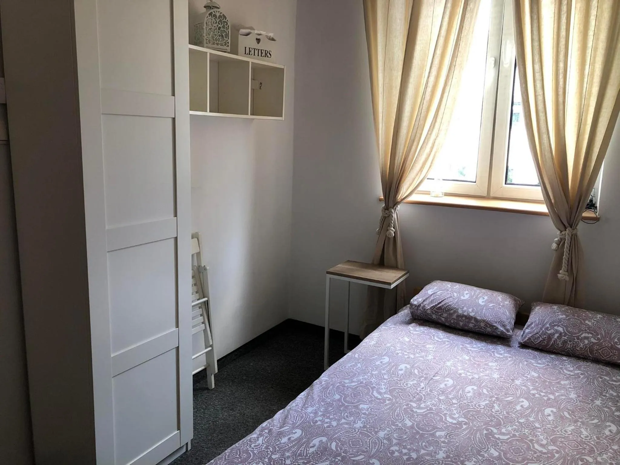 Photo of the whole room, Bed in Master Corner Apartment