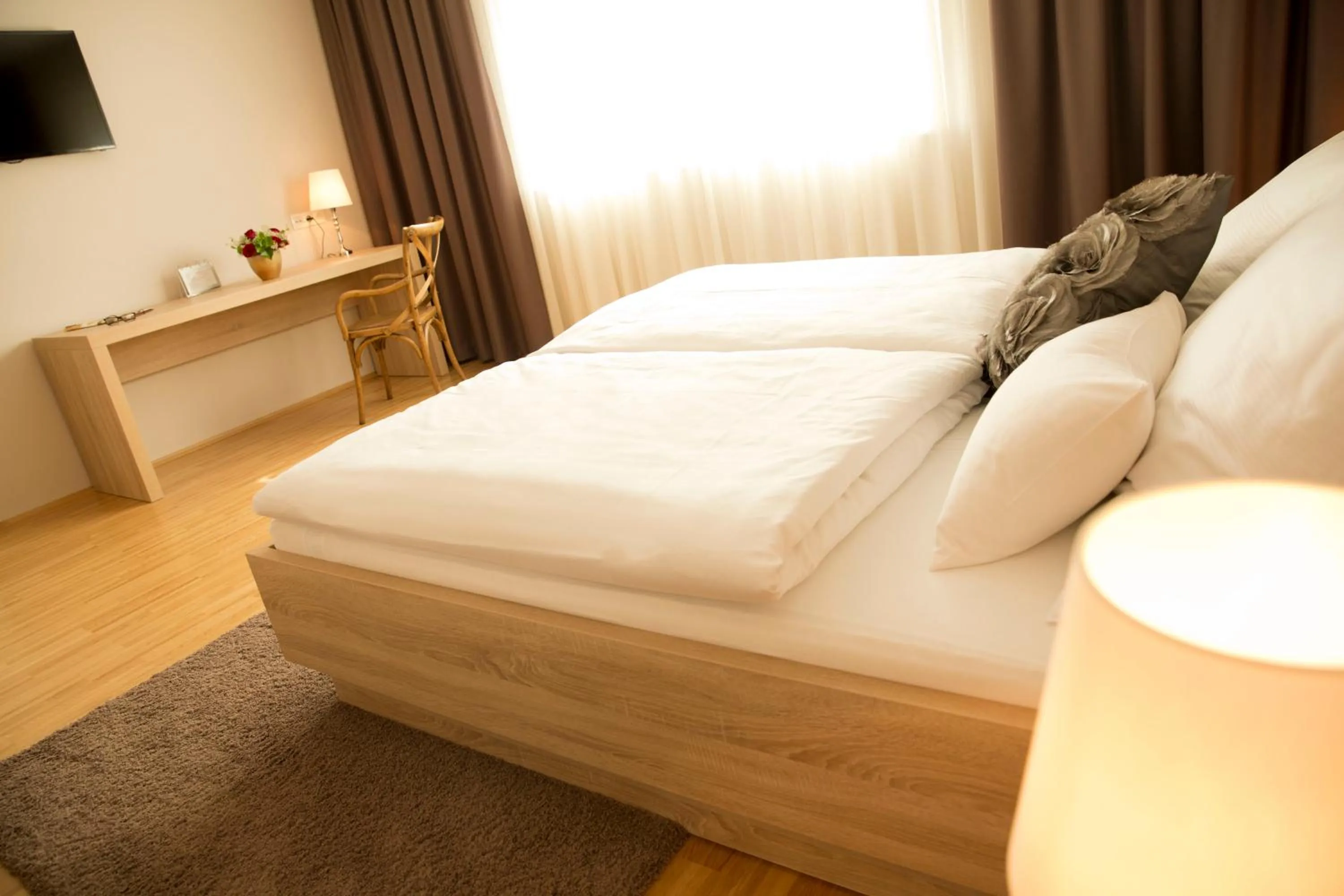 Bed in Pfeiler's Bürgerstüberl - Hotel