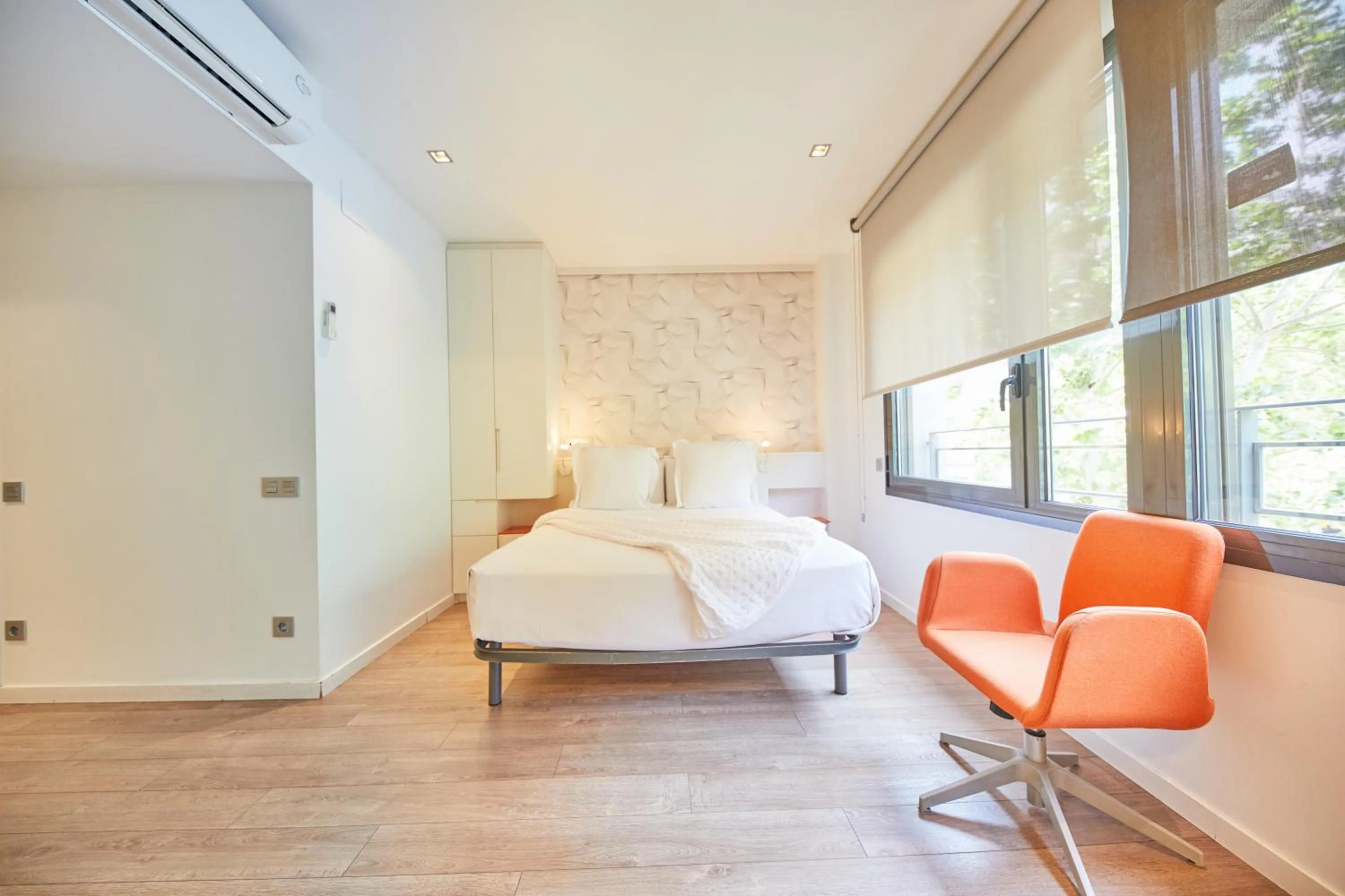 Bed in Apart-Suites Hostemplo