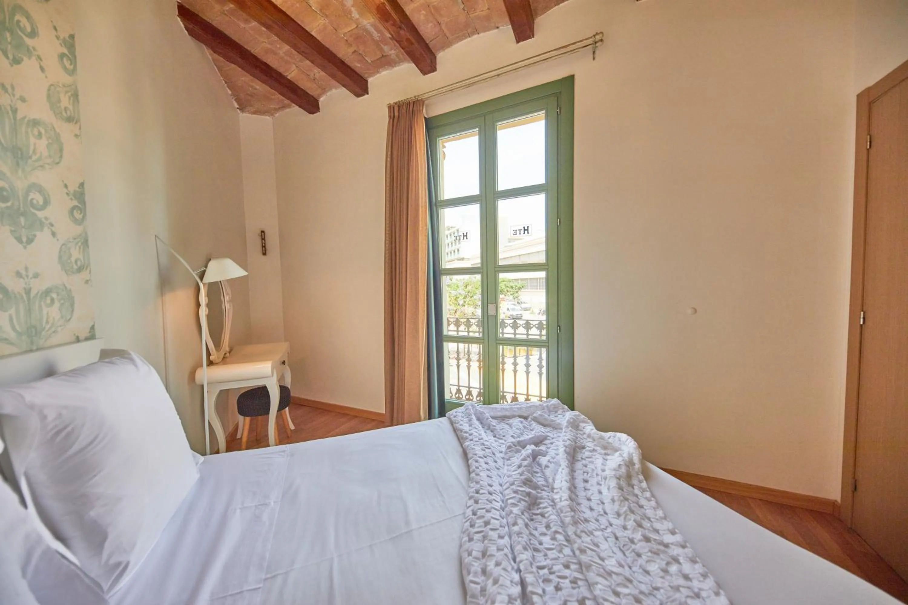 Bed in Apart-Suites Hostemplo