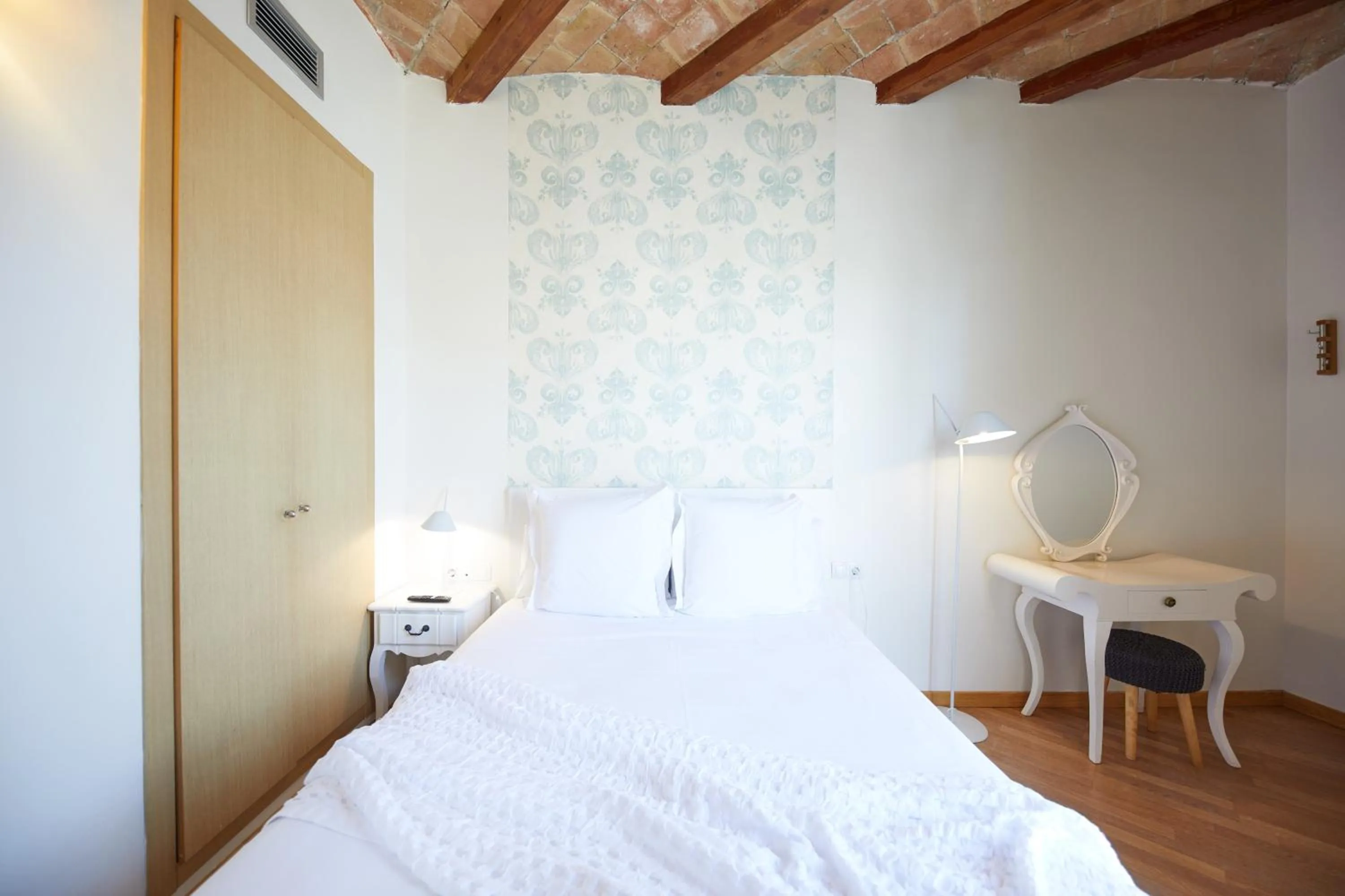 Bed in Apart-Suites Hostemplo