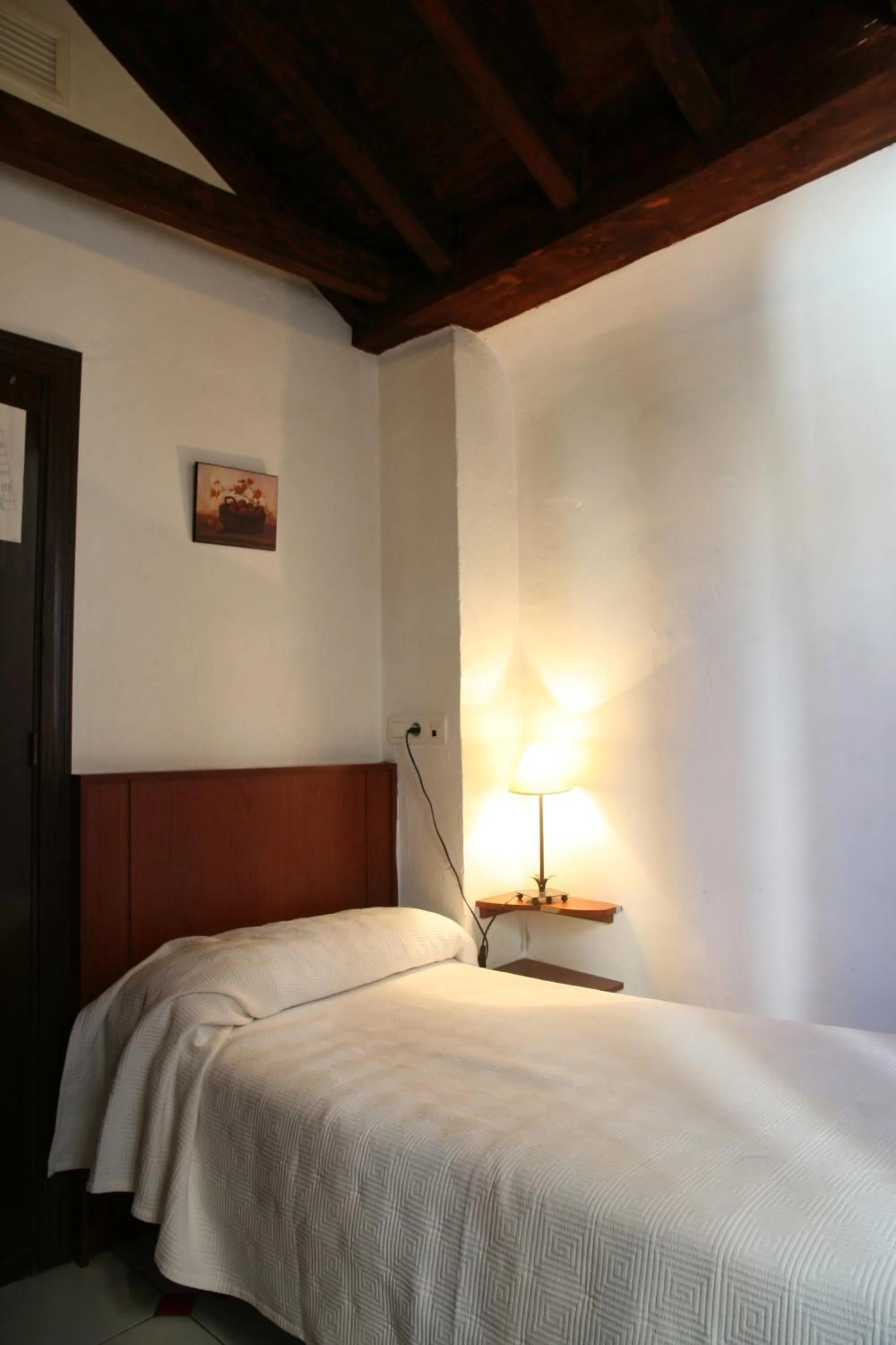 Decorative detail, Bed in Pensión San Joaquín