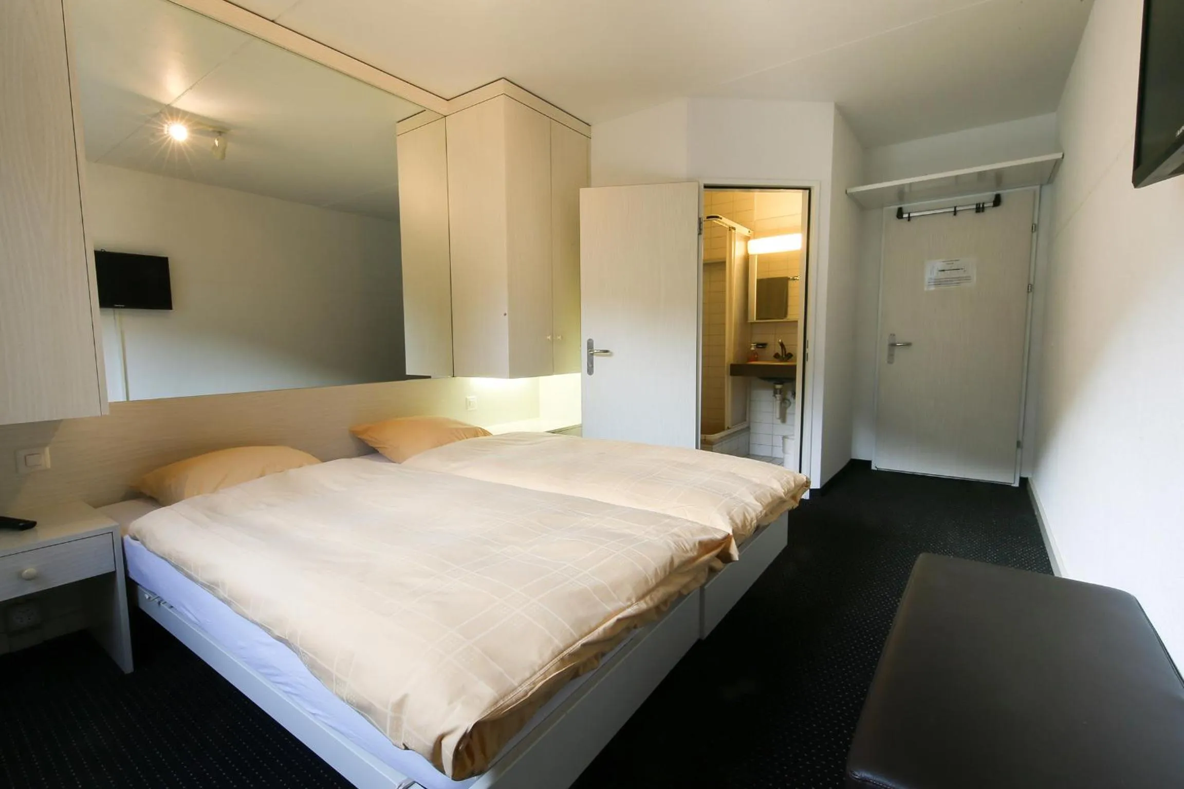 Photo of the whole room, Bed in Hotel Grüsch