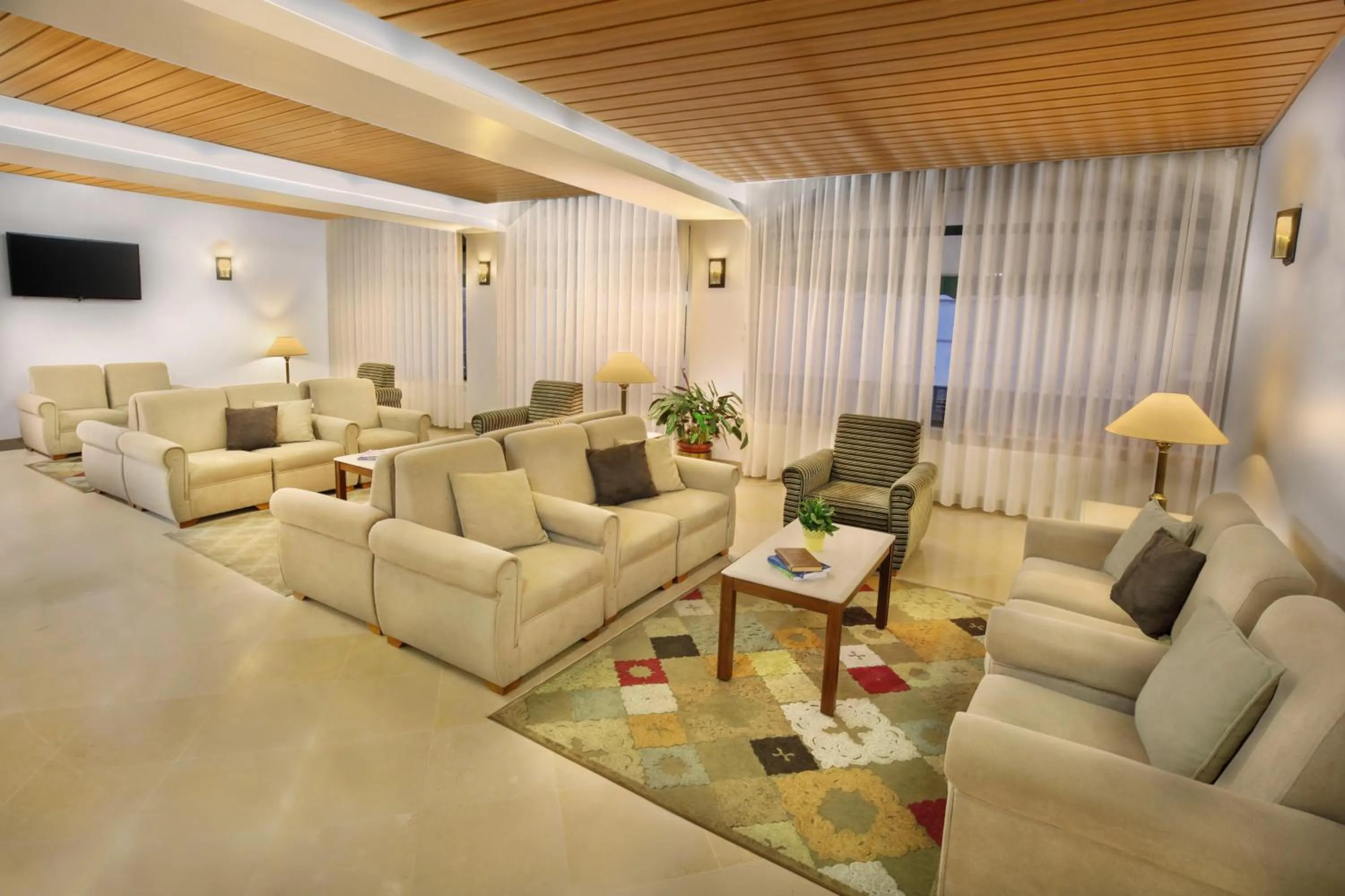 Communal lounge/ TV room in Hotel Santo António de Fátima