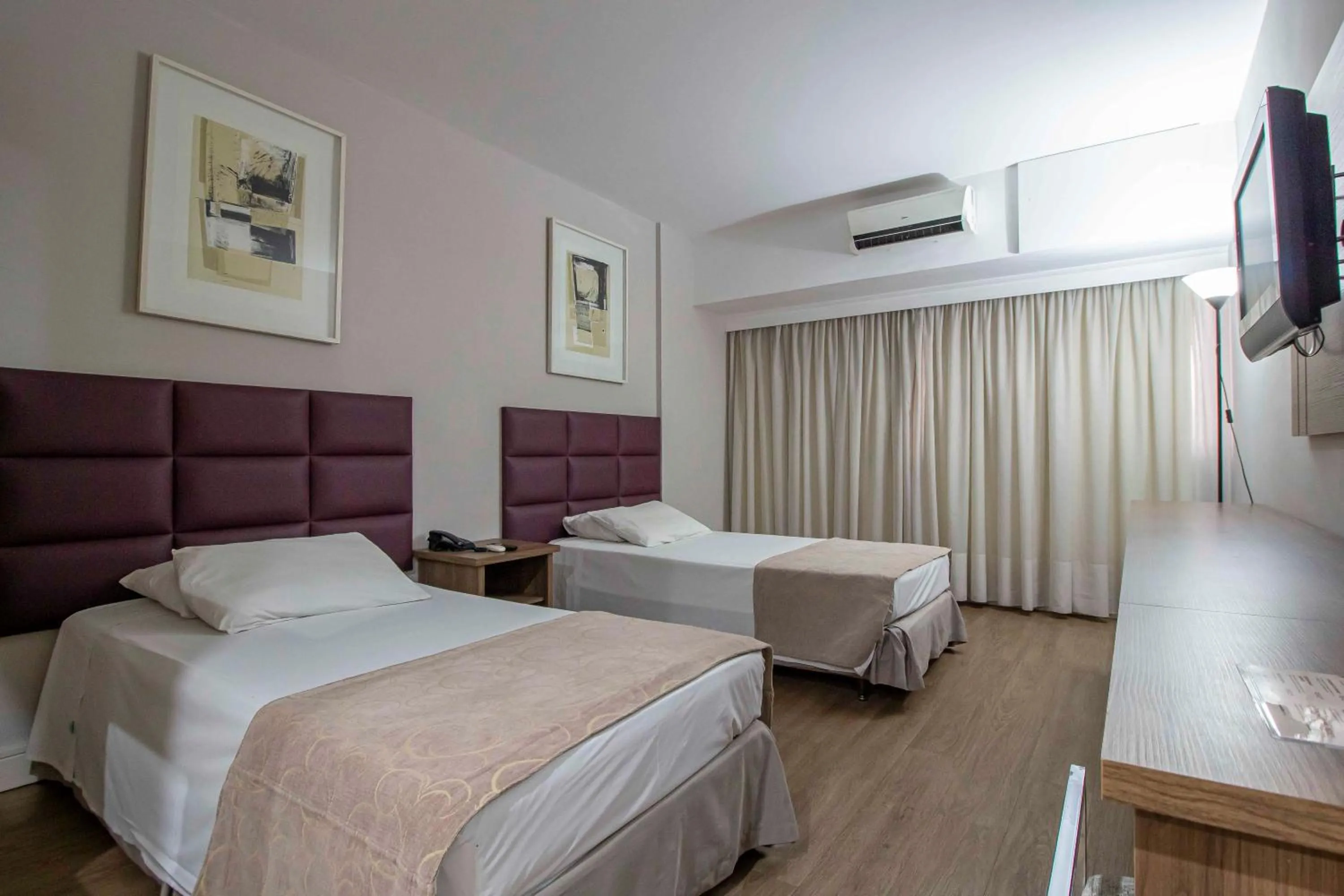 Bed in Hotel Victoria Villa Curitiba by Nacional Inn