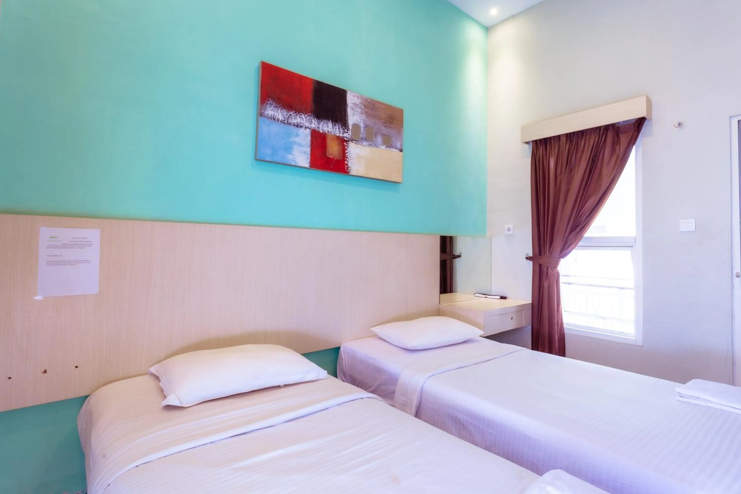 Bed in Ardhya Guesthouse Syariah by ecommerceloka