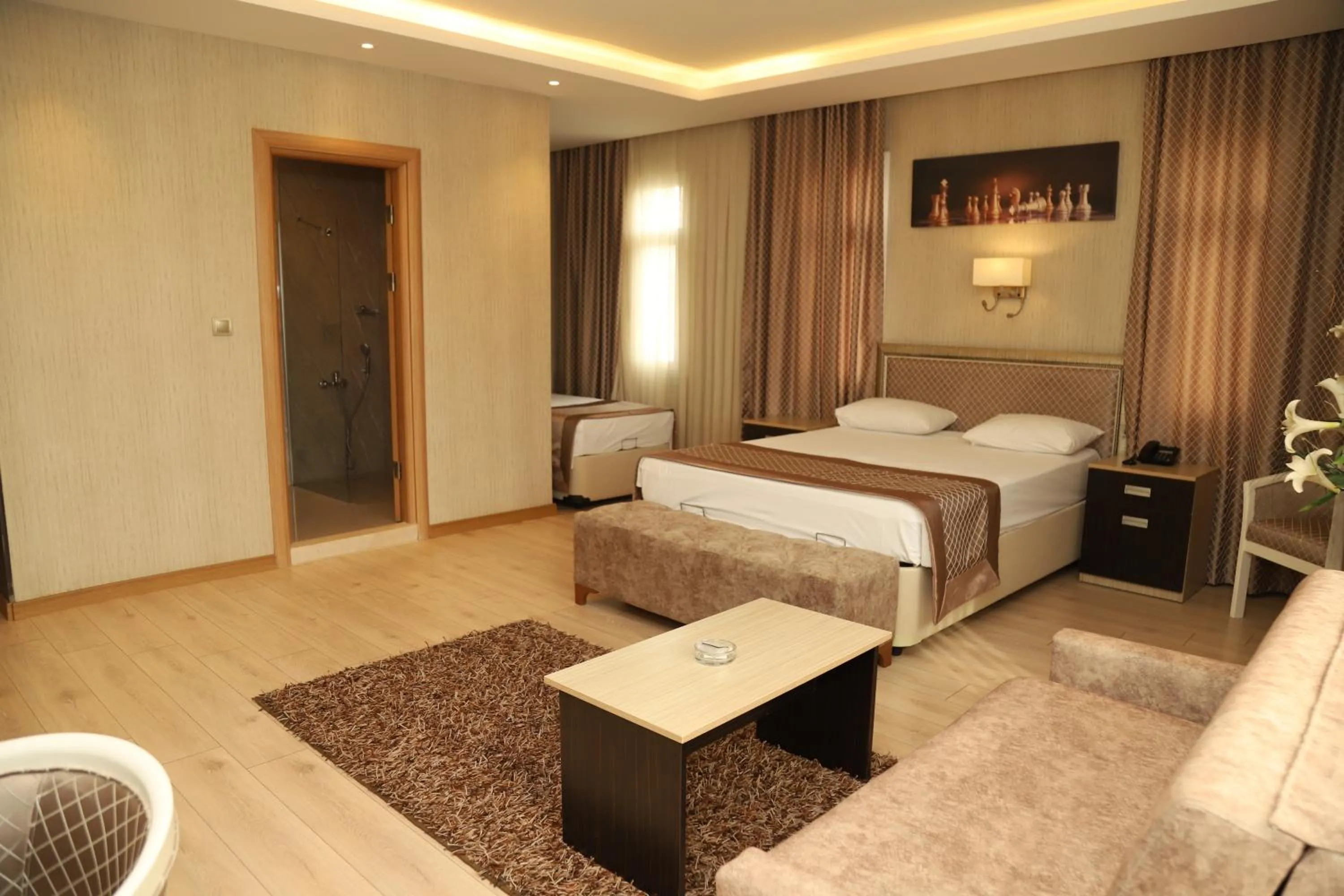 Bed in Othello Hotel