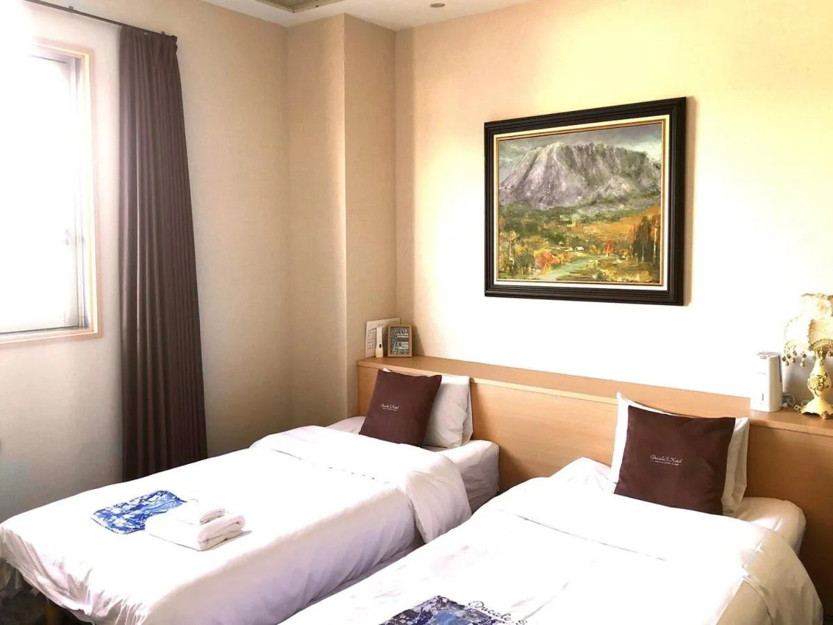 Bed in Ducale Garden Hotel Kujukuri