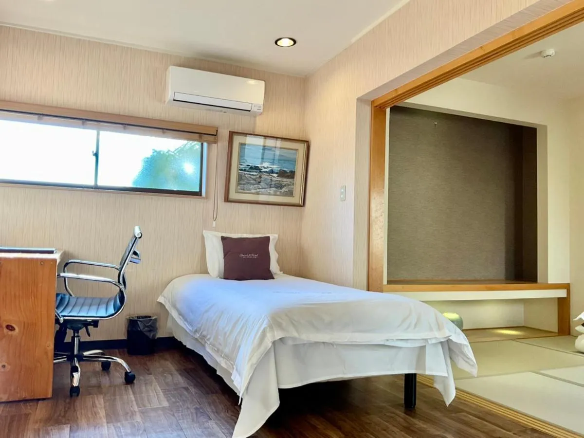 Bed in Ducale Garden Hotel Kujukuri