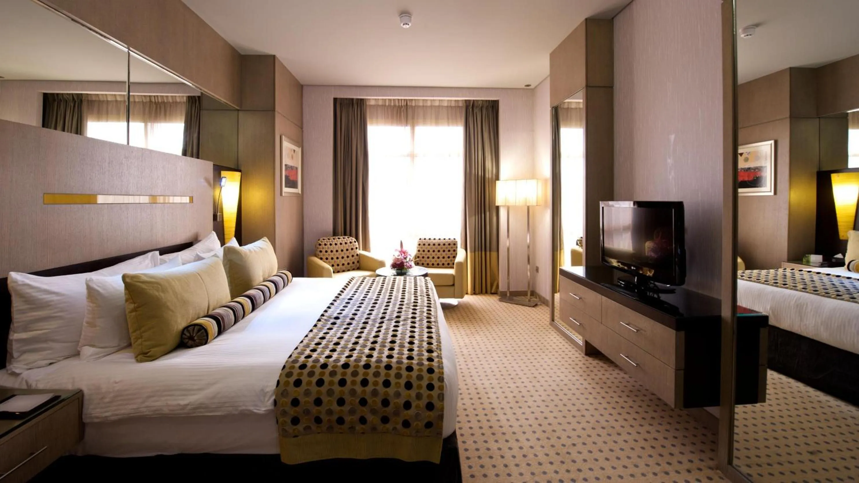 Photo of the whole room, Bed in TIME Grand Plaza Hotel, Dubai Airport