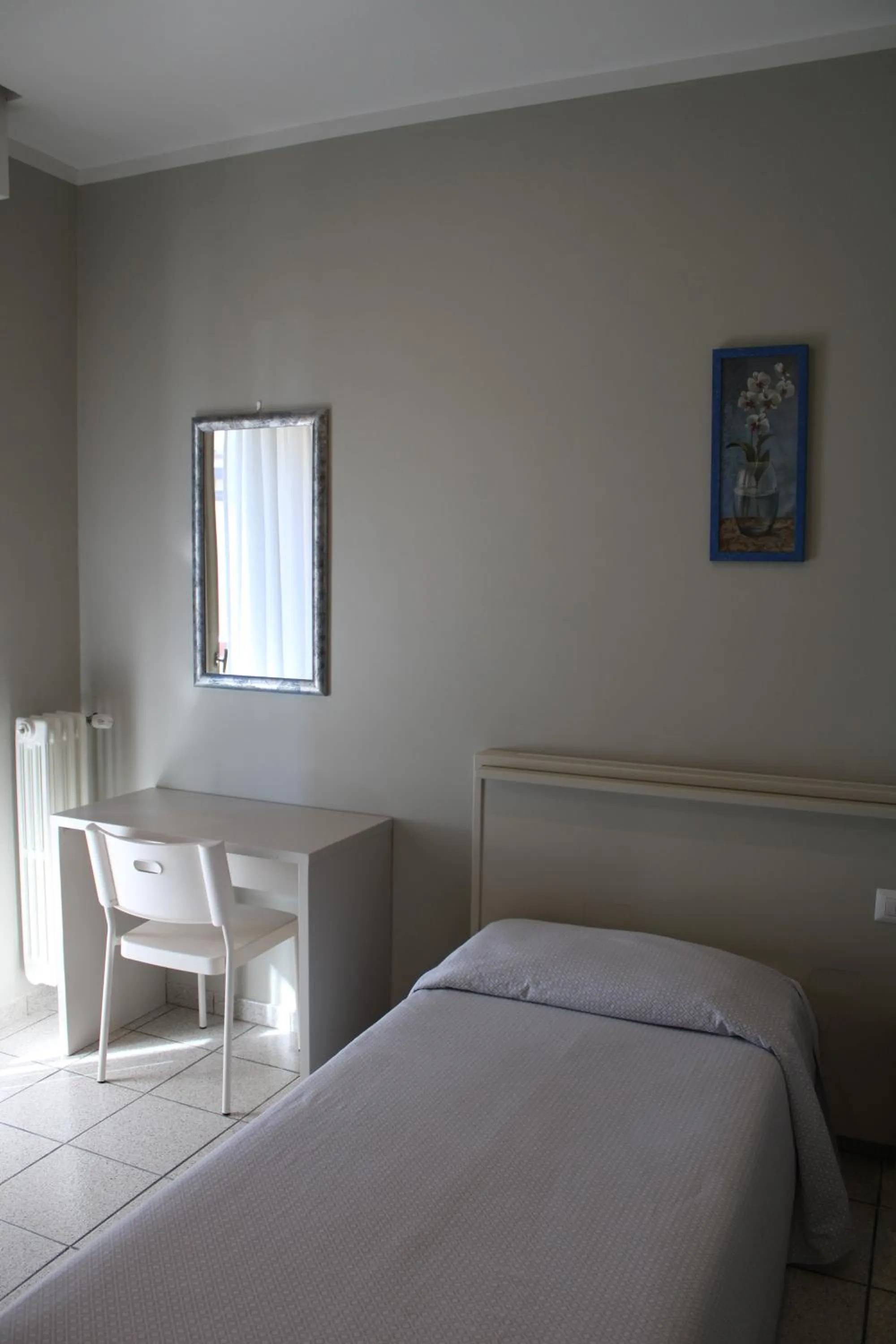 Bed in Hotel Delfina