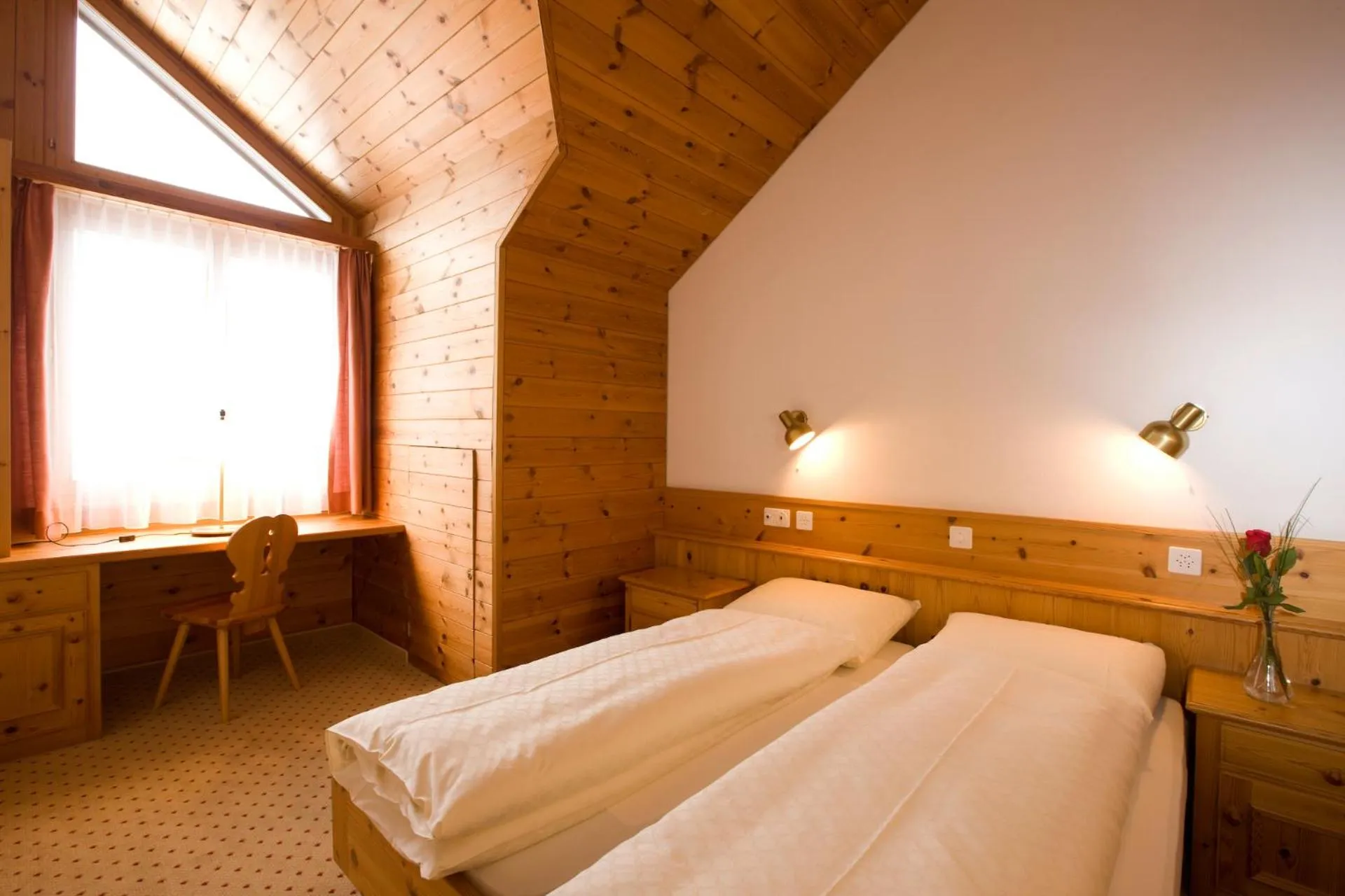 Bed in Hotel Laaxerhof