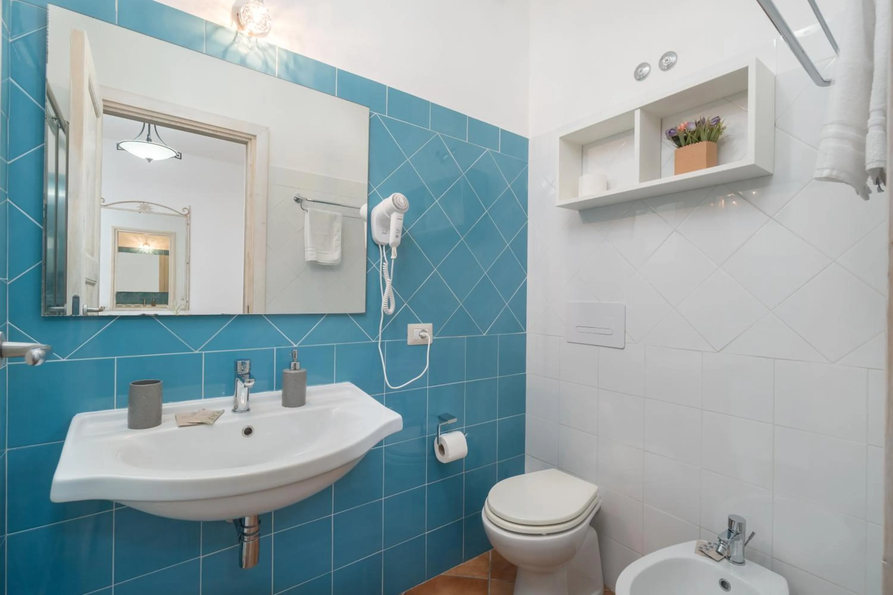 Toilet in Bosa Queen House