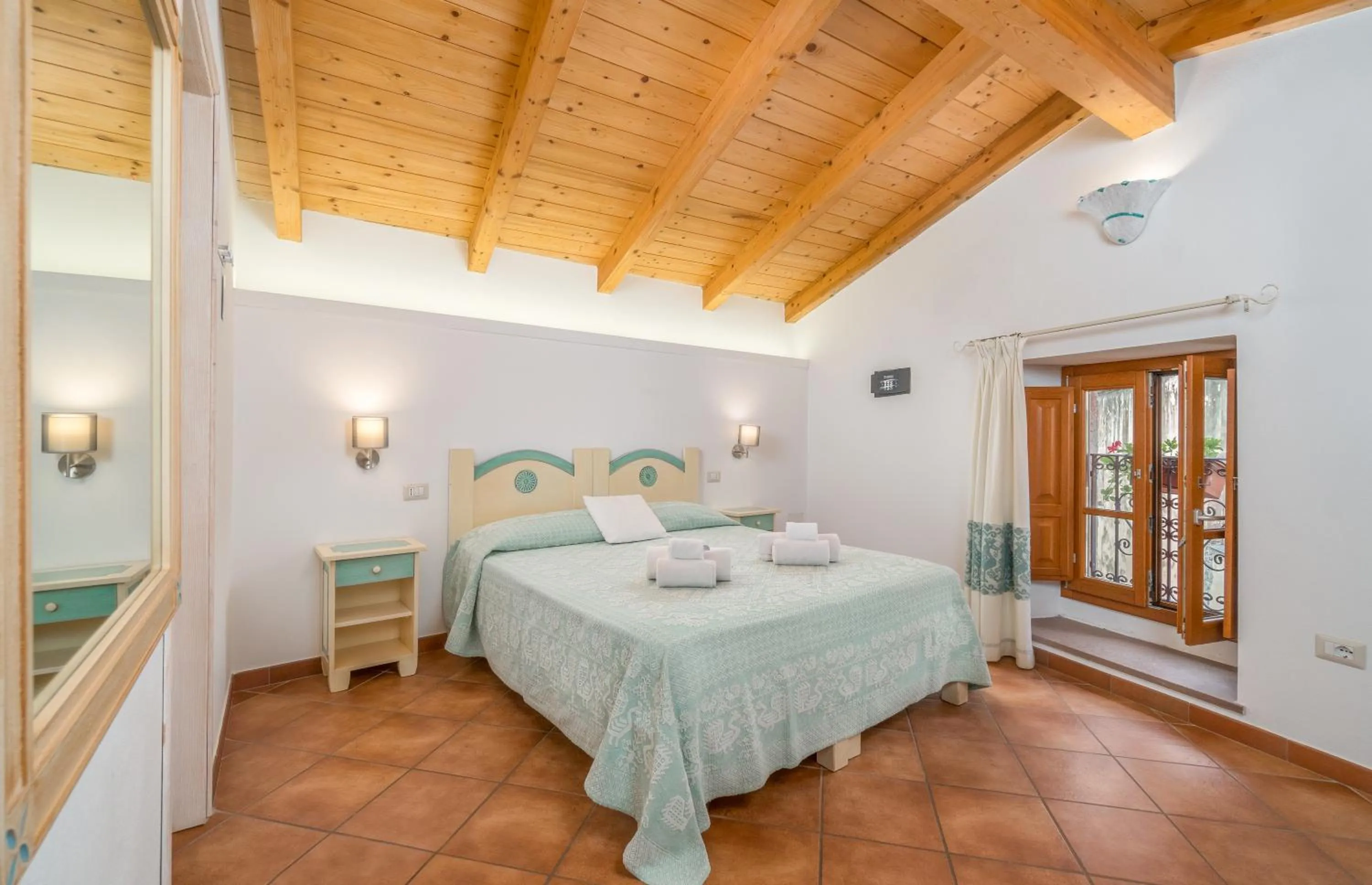 Bed in Bosa Queen House