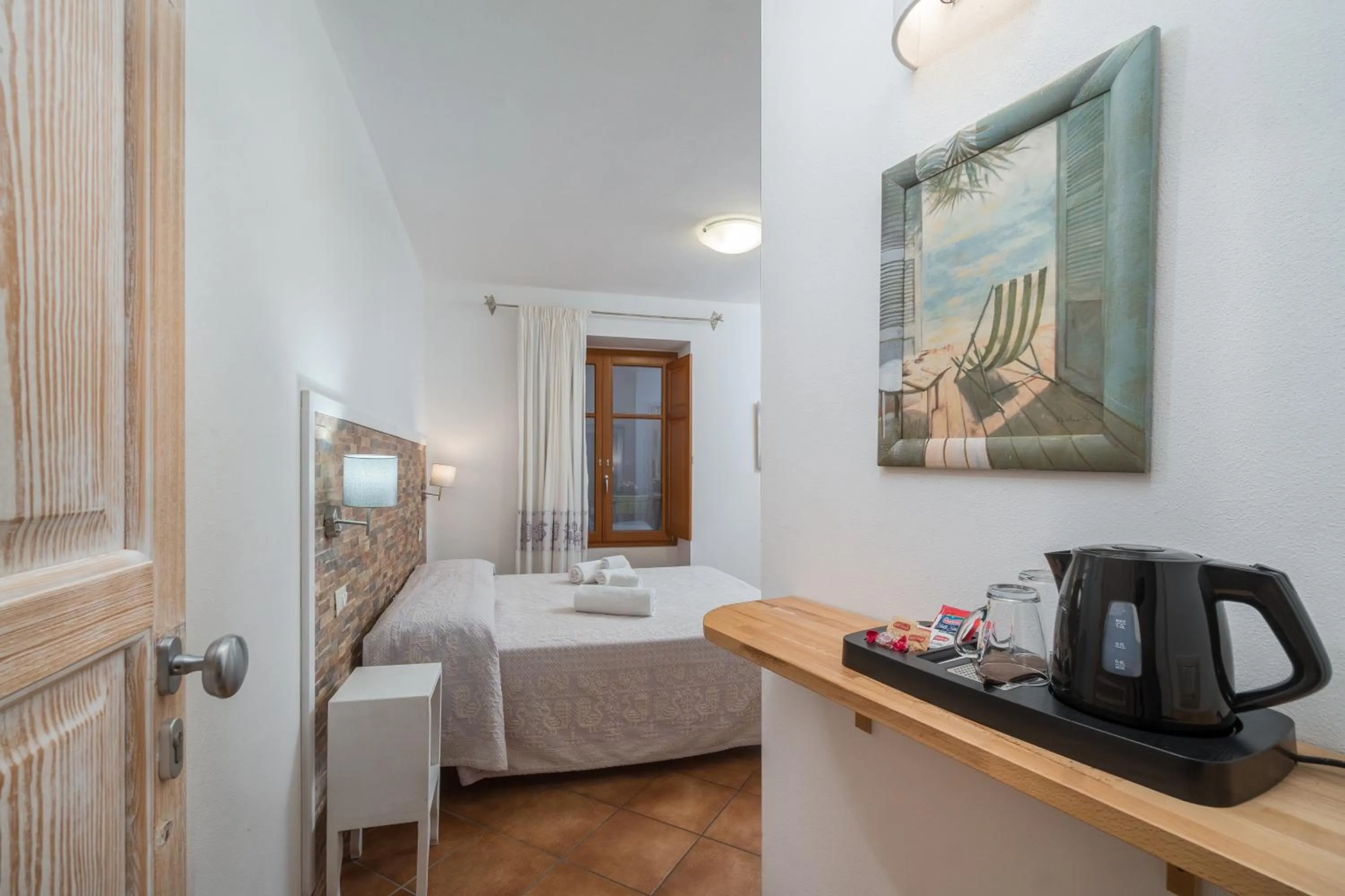 Bed in Bosa Queen House