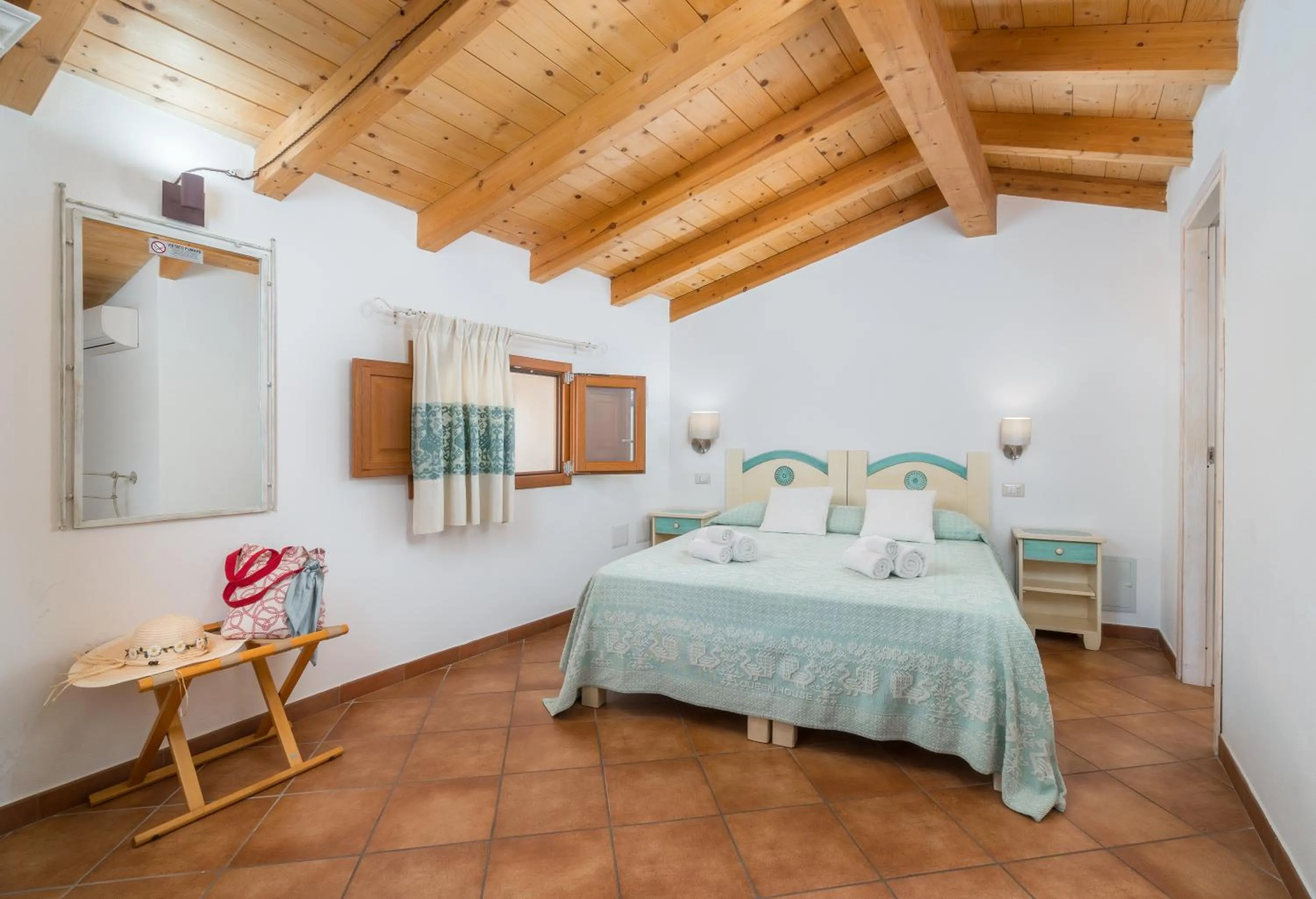 Bed in Bosa Queen House