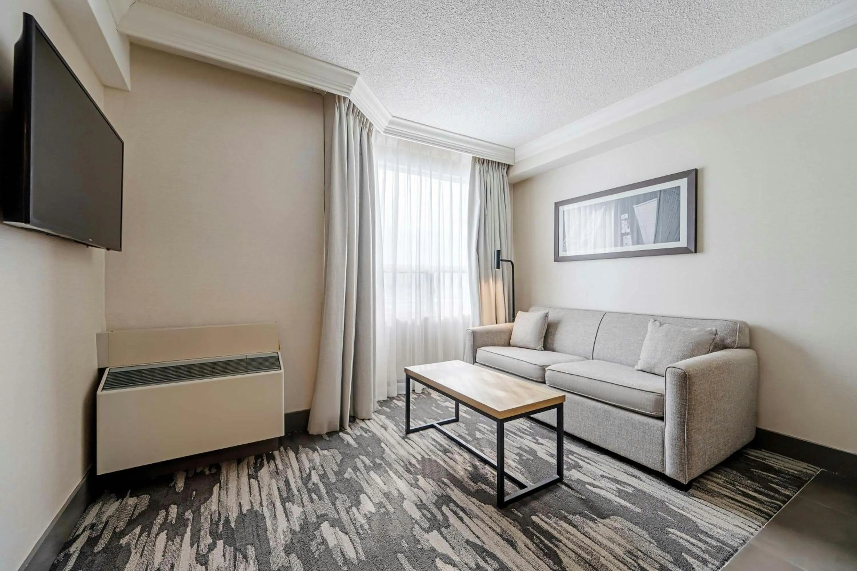 Living room in Sandman Signature Mississauga Hotel