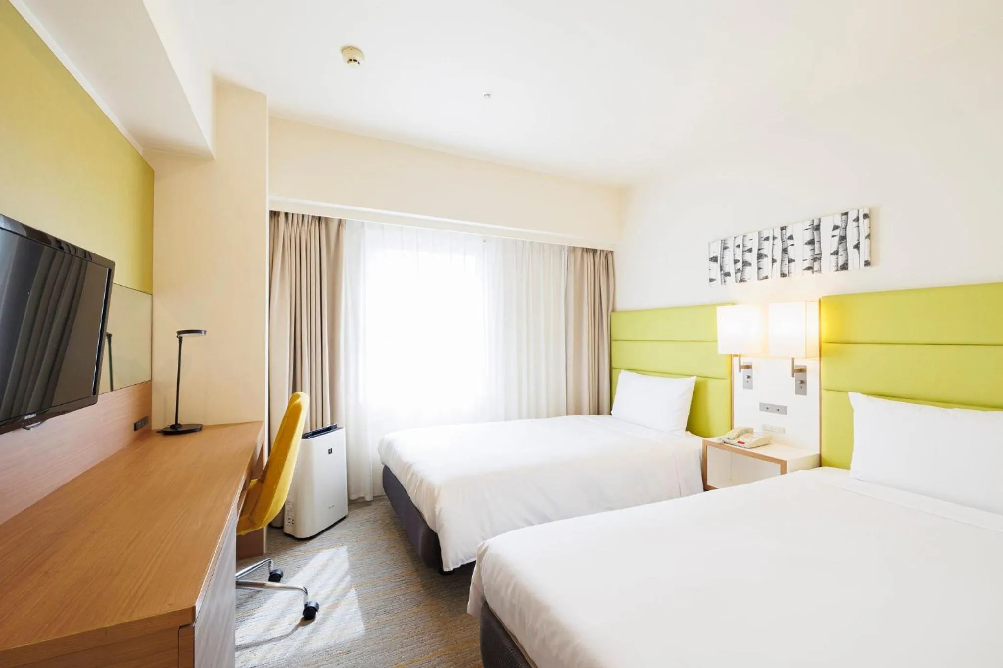 Photo of the whole room, Bed in ANA Holiday Inn Sapporo Susukino by IHG