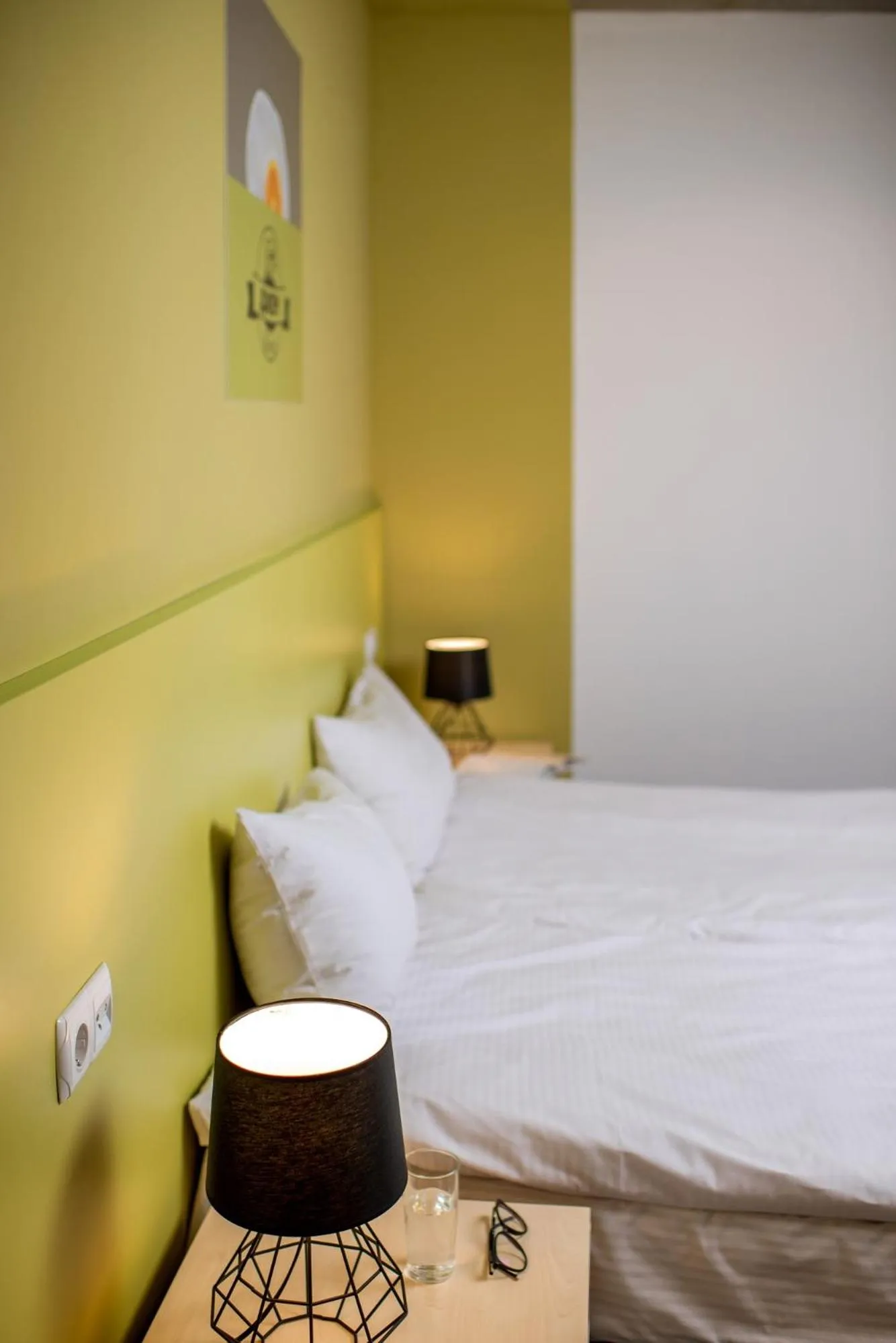 Photo of the whole room, Bed in Jam Hotel Hnatyuka