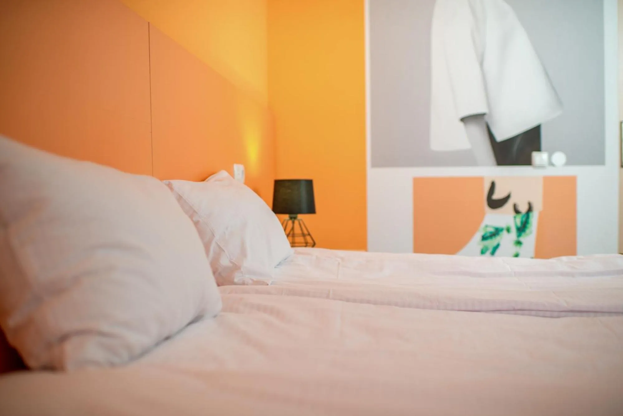 Photo of the whole room, Bed in Jam Hotel Hnatyuka