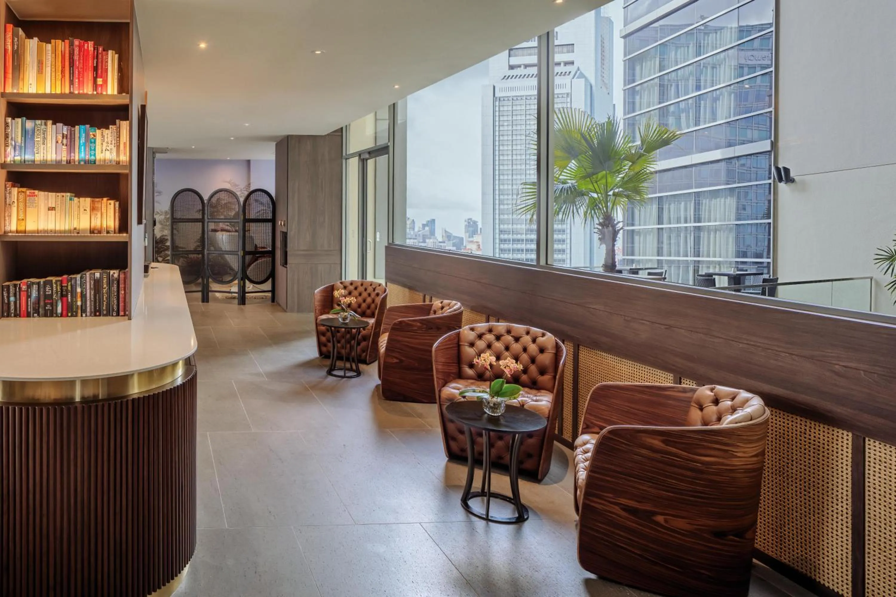 Communal lounge/ TV room in Pan Pacific Serviced Suites Orchard, Singapore