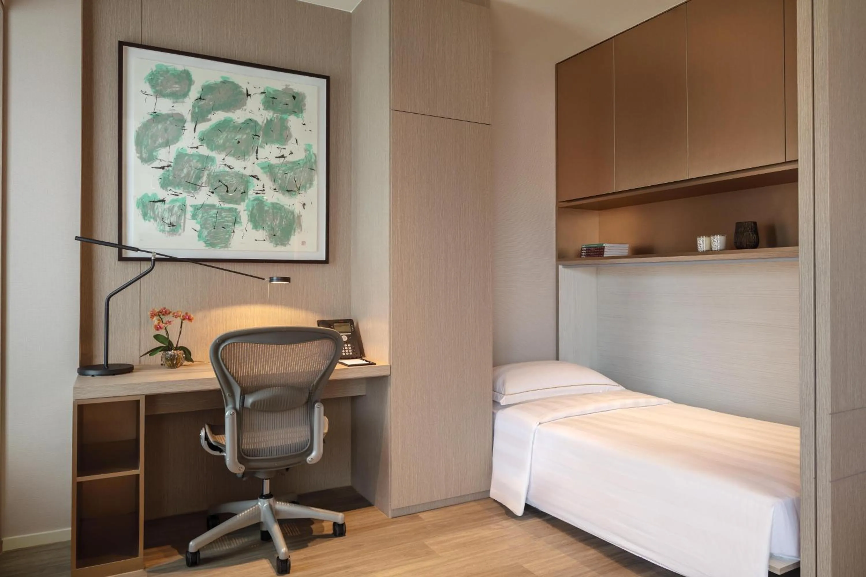 Living room, Bed in Pan Pacific Serviced Suites Orchard, Singapore