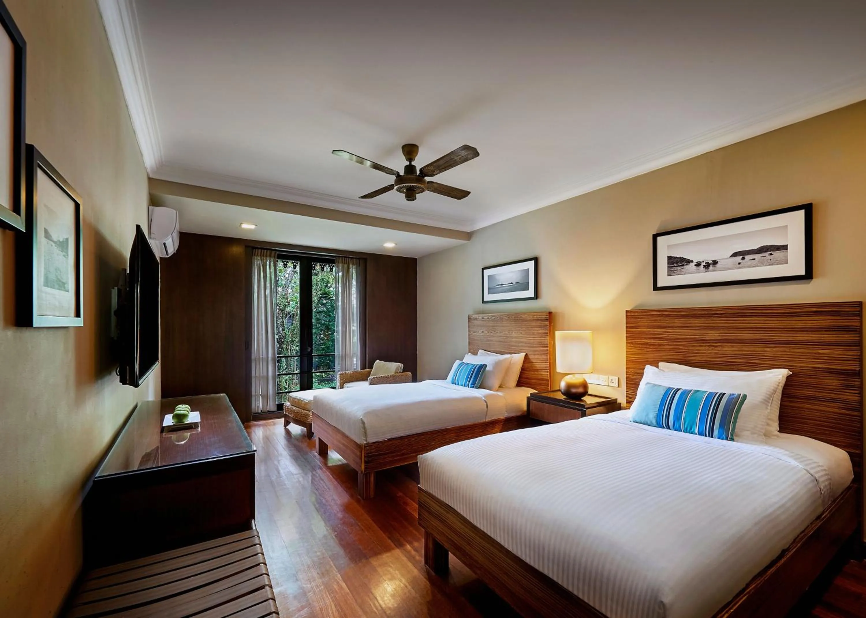Bed in The Taaras Beach & Spa Resort