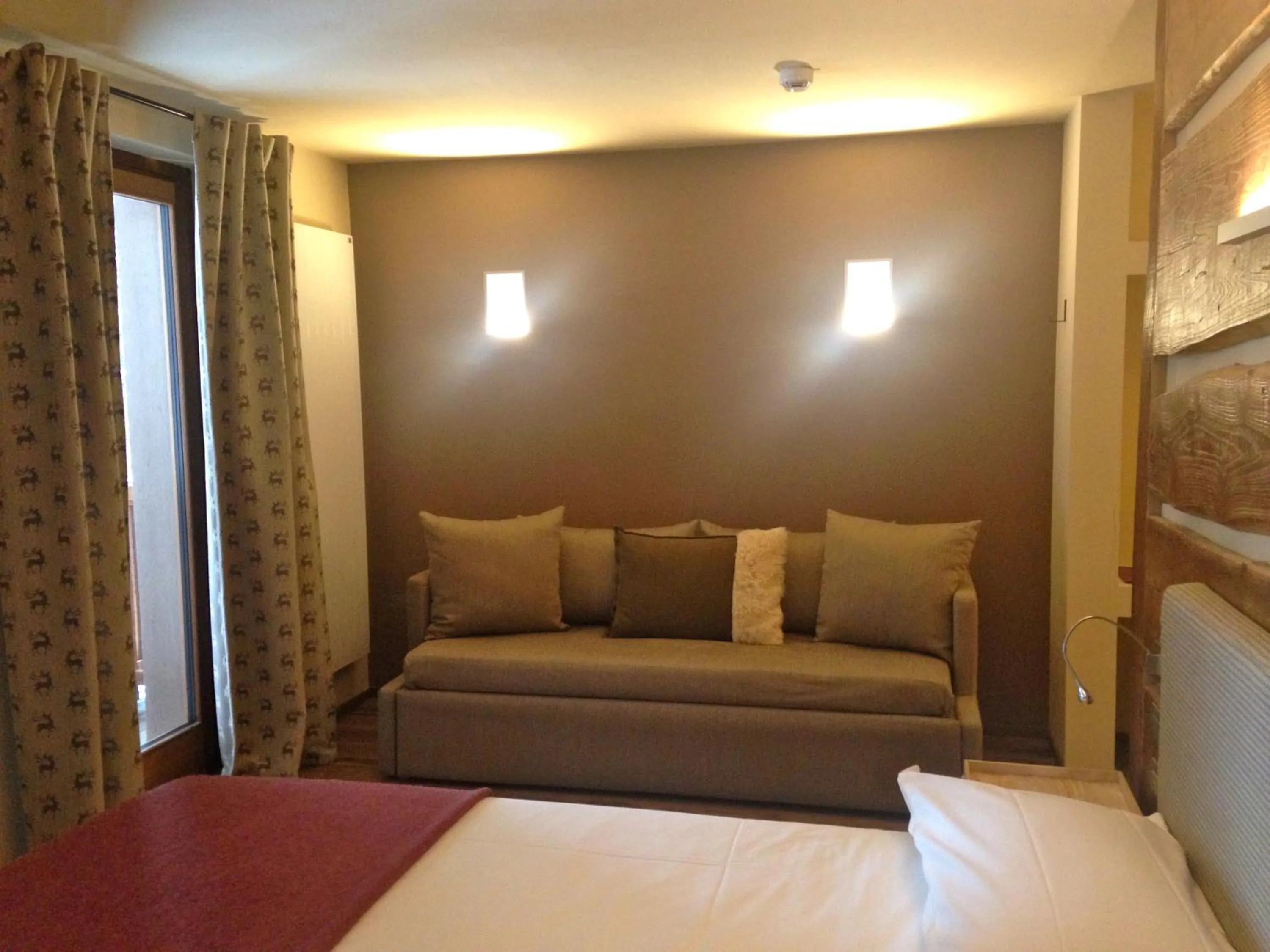 Bed in Chalet Eden Eco Hotel, Restaurant & Wellness