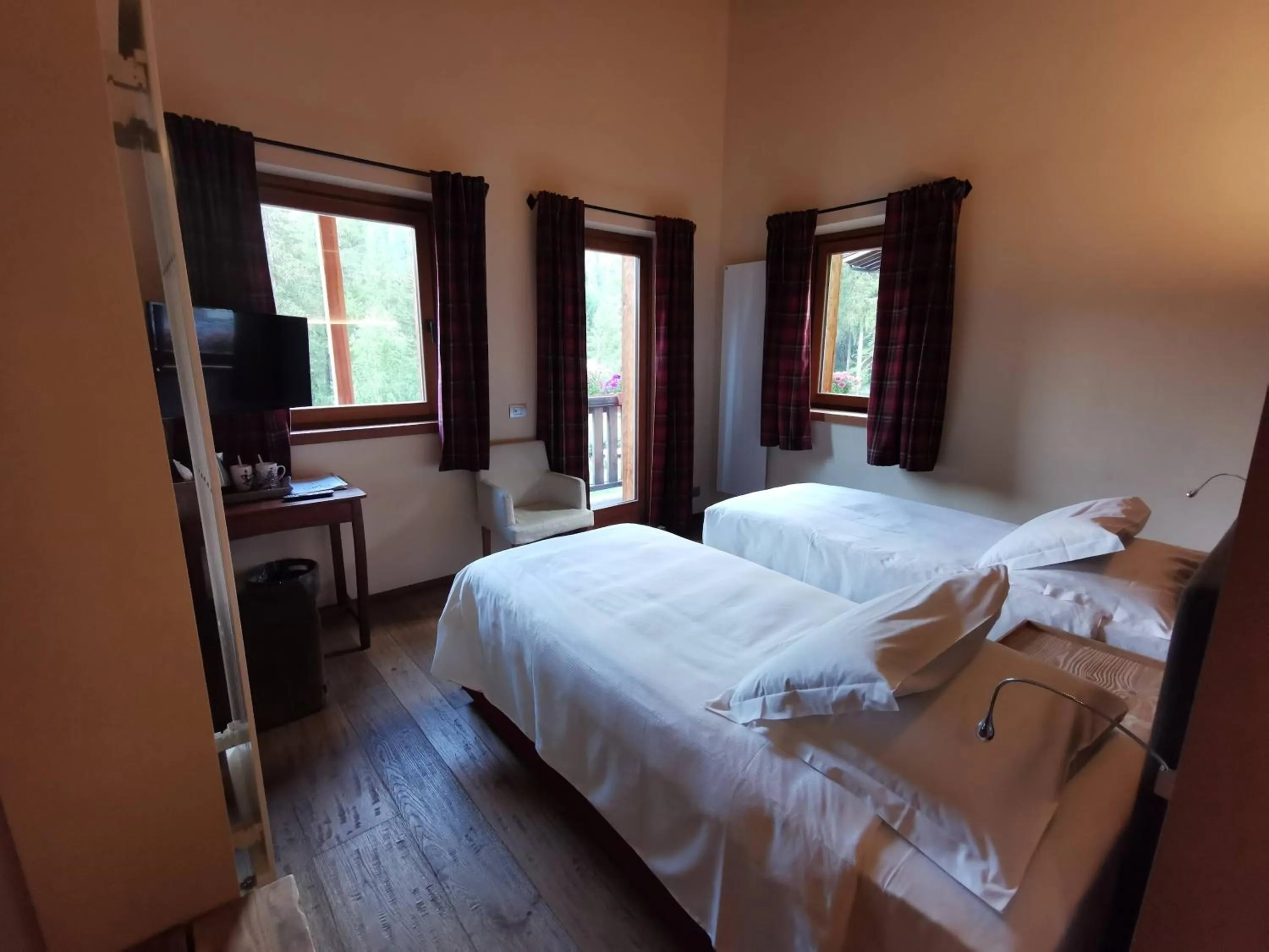 Bed in Chalet Eden Eco Hotel, Restaurant & Wellness