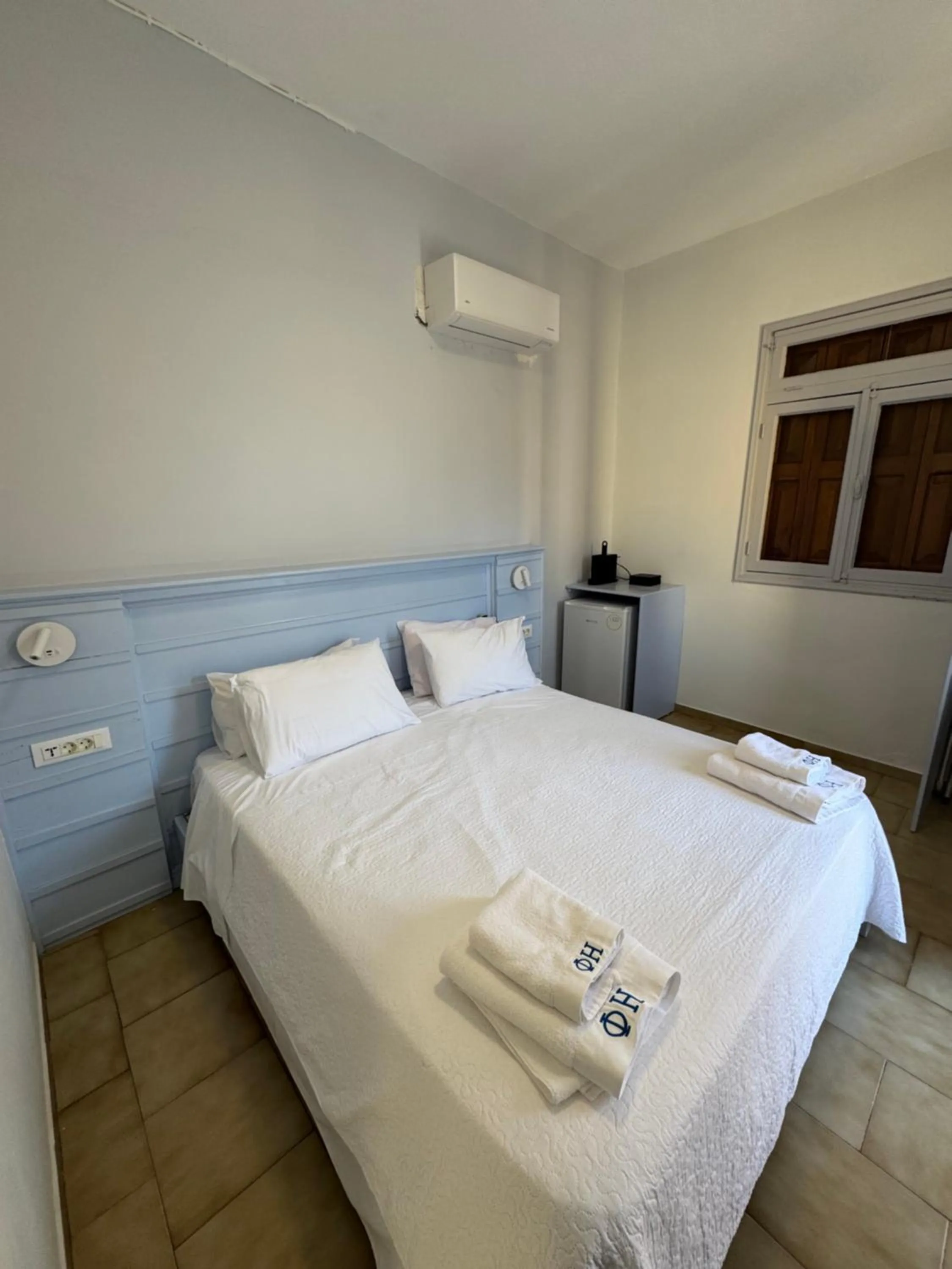 Bed in Hotel Fiona Symi