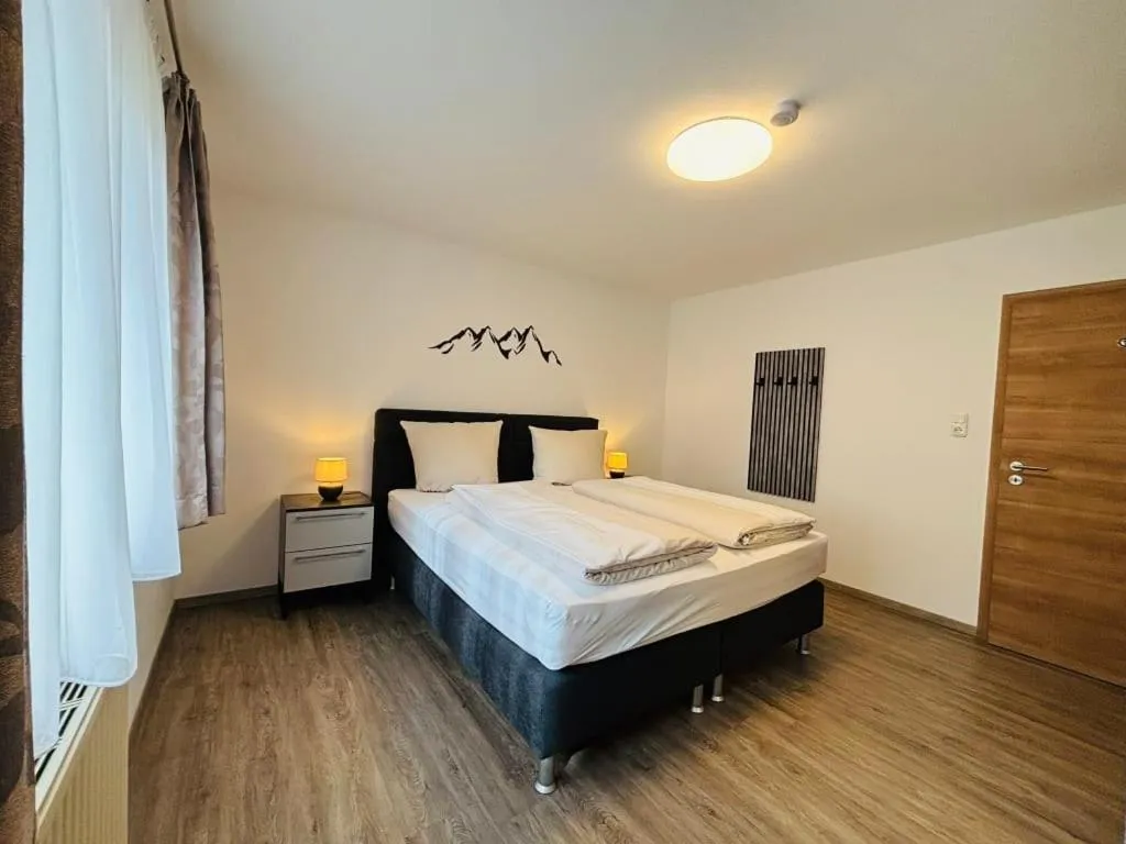 Bed in Aparthotel Dorfplatzl Garni Apartments & B&B