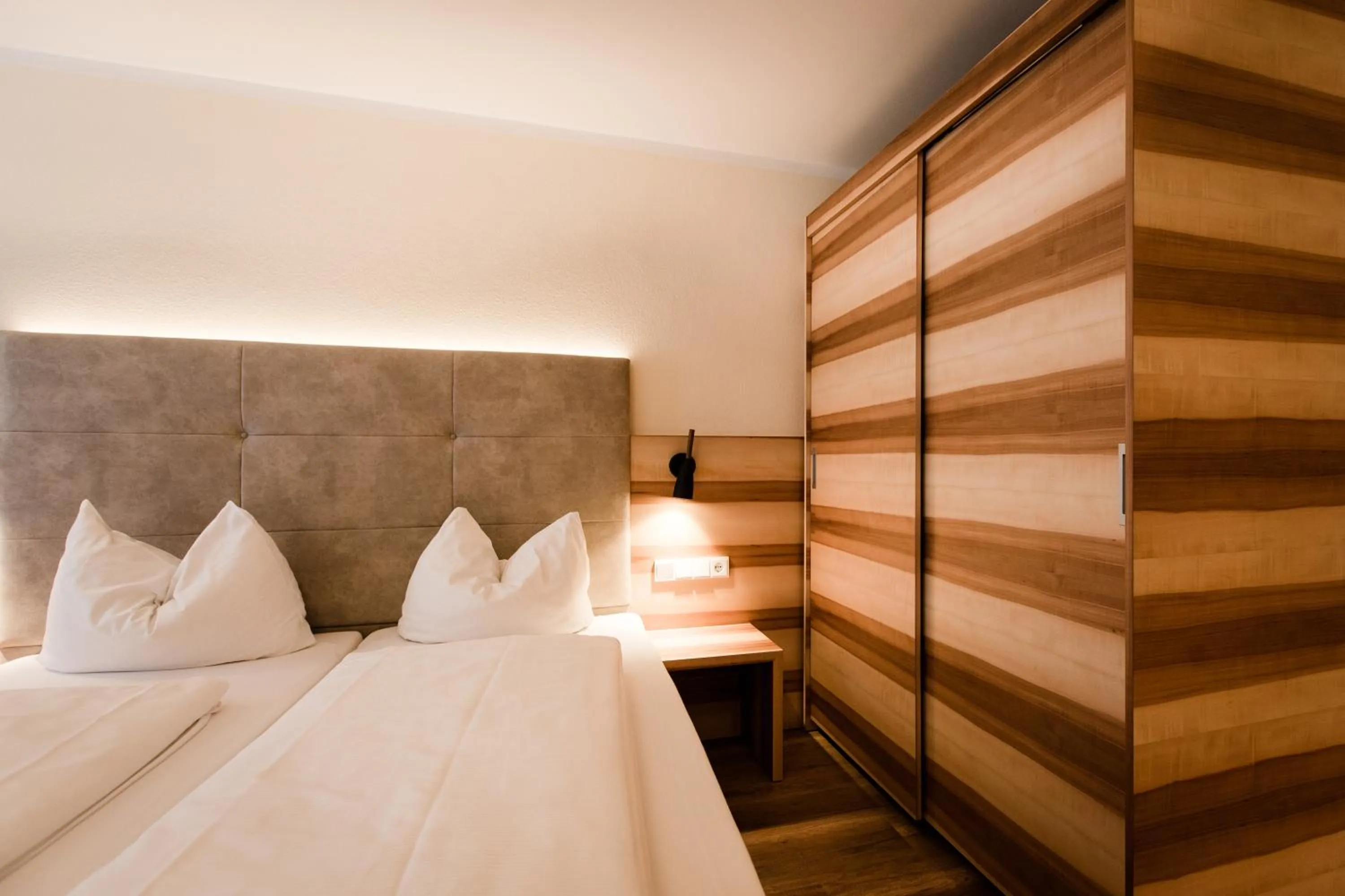 Bed in Aparthotel Dorfplatzl Garni Apartments & B&B