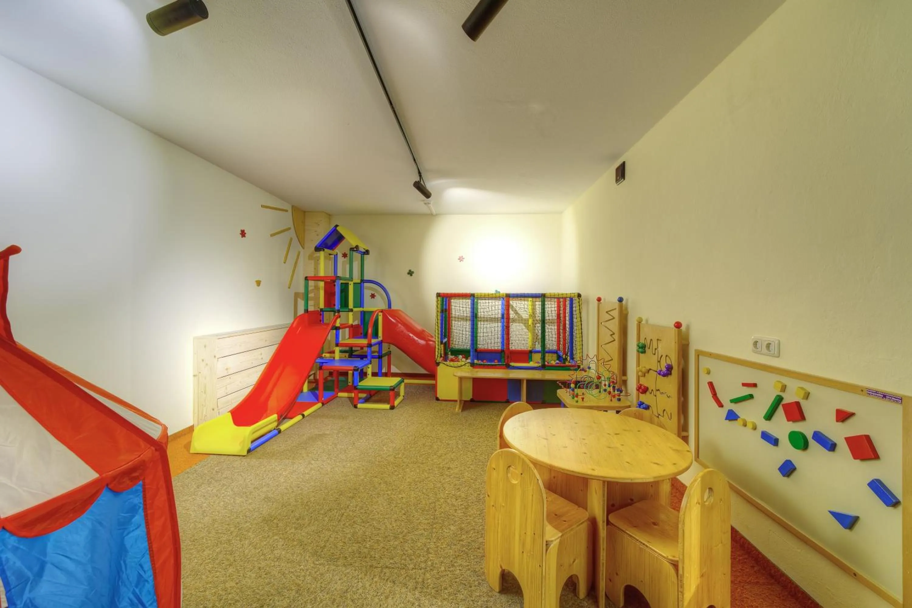 Children play ground in Aparthotel Dorfplatzl Garni Apartments & B&B