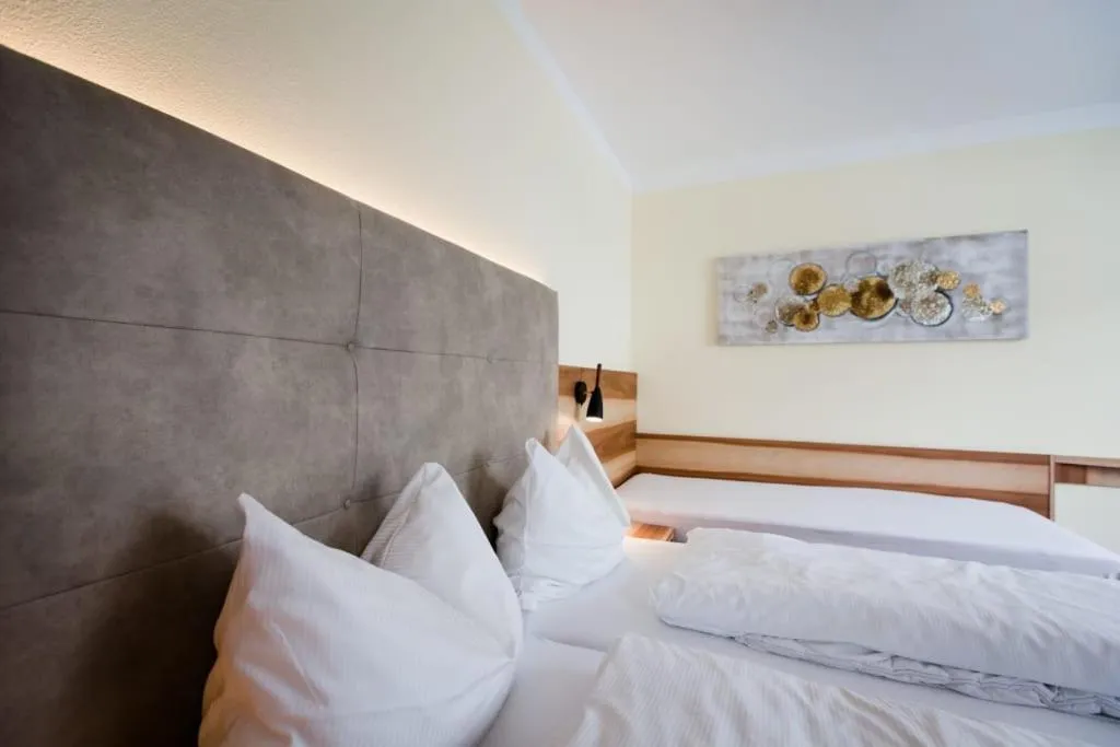 Bedroom, Bed in Aparthotel Dorfplatzl Garni Apartments & B&B