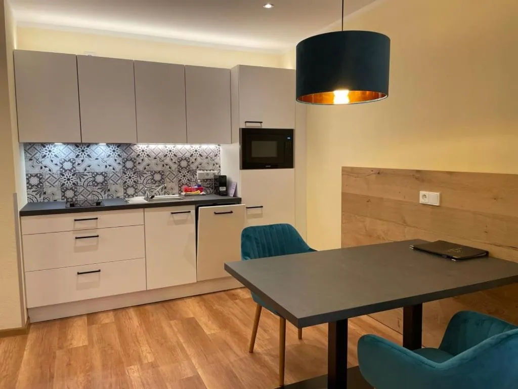 Dining area in Aparthotel Dorfplatzl Garni Apartments & B&B