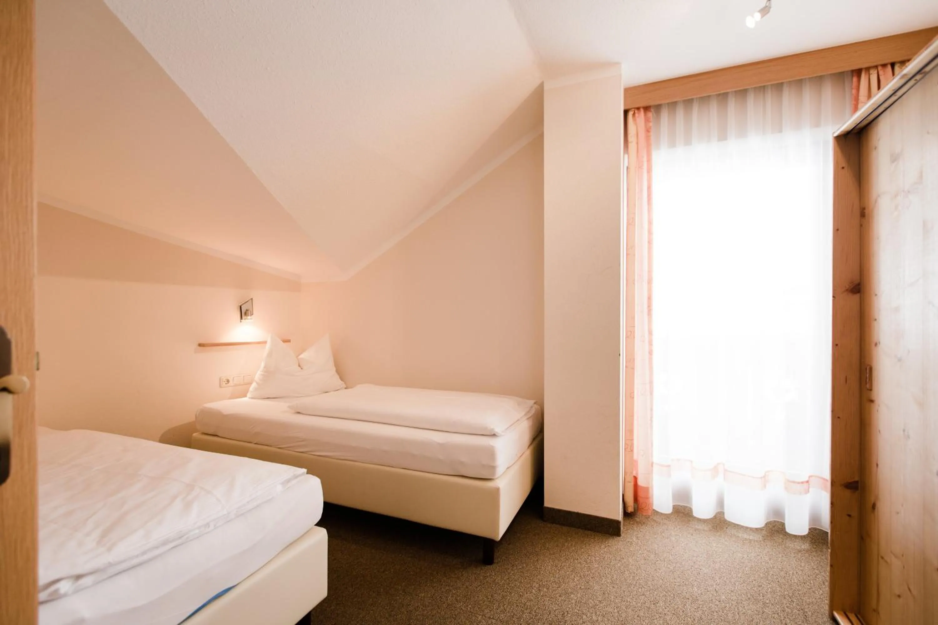 Bedroom, Bed in Aparthotel Dorfplatzl Garni Apartments & B&B