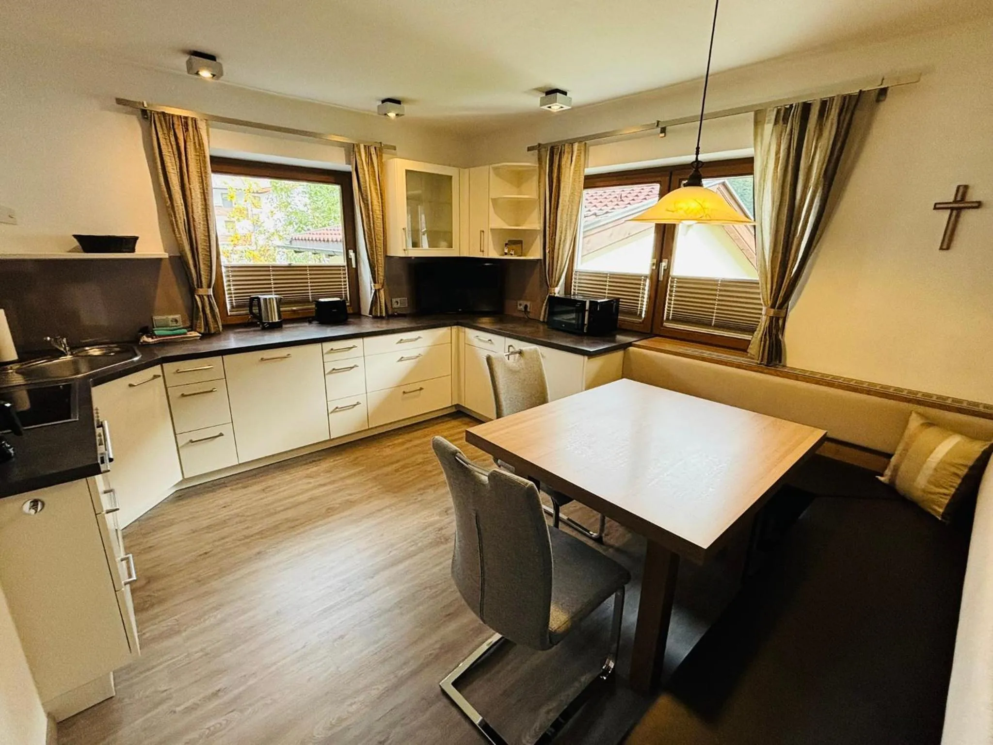 Kitchen or kitchenette in Aparthotel Dorfplatzl Garni Apartments & B&B