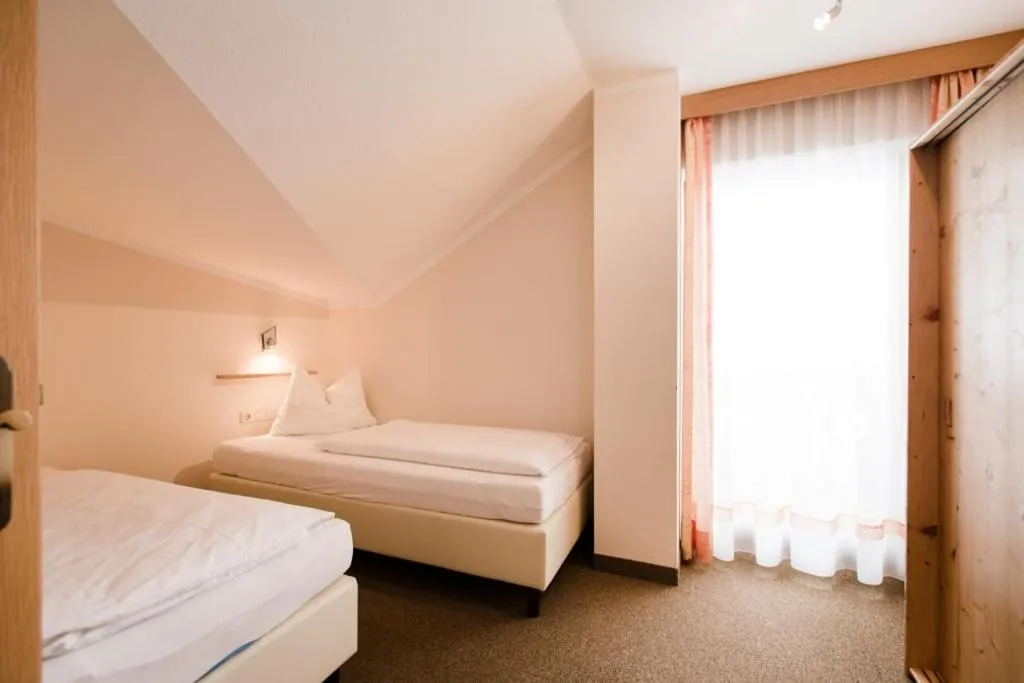 Bedroom, Bed in Aparthotel Dorfplatzl Garni Apartments & B&B