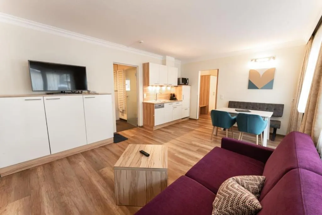 Kitchen or kitchenette in Aparthotel Dorfplatzl Garni Apartments & B&B