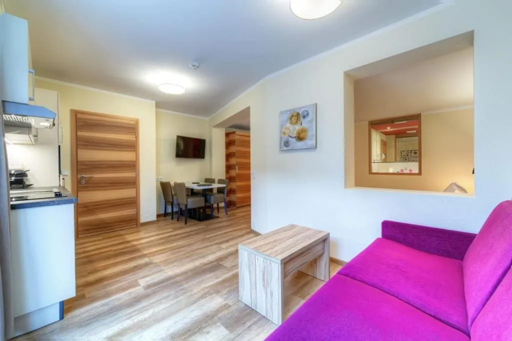 Kitchen or kitchenette in Aparthotel Dorfplatzl Garni Apartments & B&B