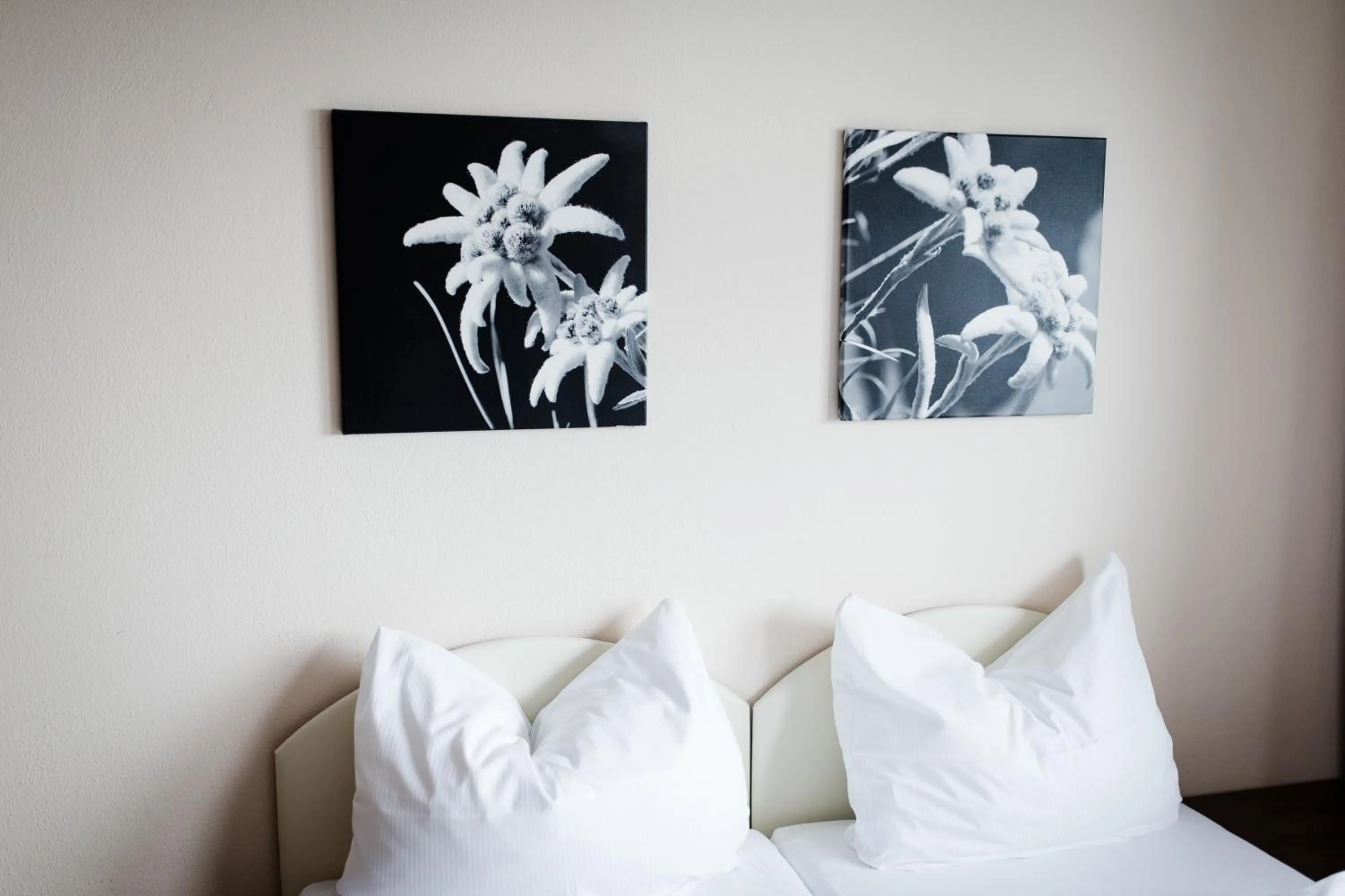 Decorative detail, Bed in Aparthotel Dorfplatzl Garni Apartments & B&B