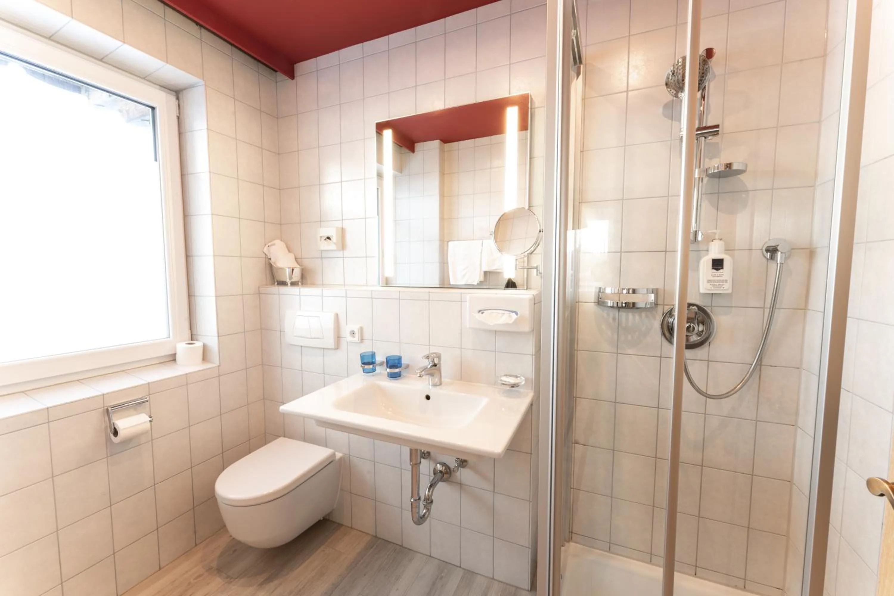 Shower in Aparthotel Dorfplatzl Garni Apartments & B&B