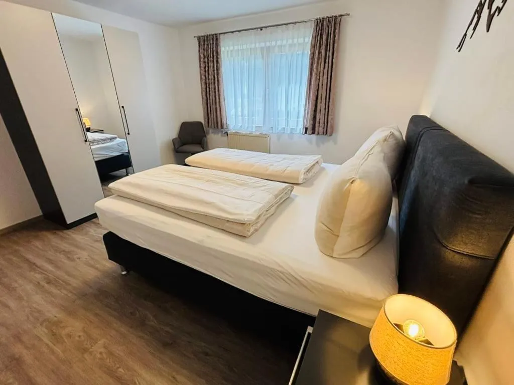 Bedroom, Bed in Aparthotel Dorfplatzl Garni Apartments & B&B