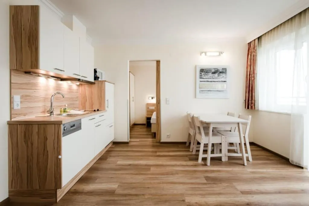 Kitchen or kitchenette in Aparthotel Dorfplatzl Garni Apartments & B&B