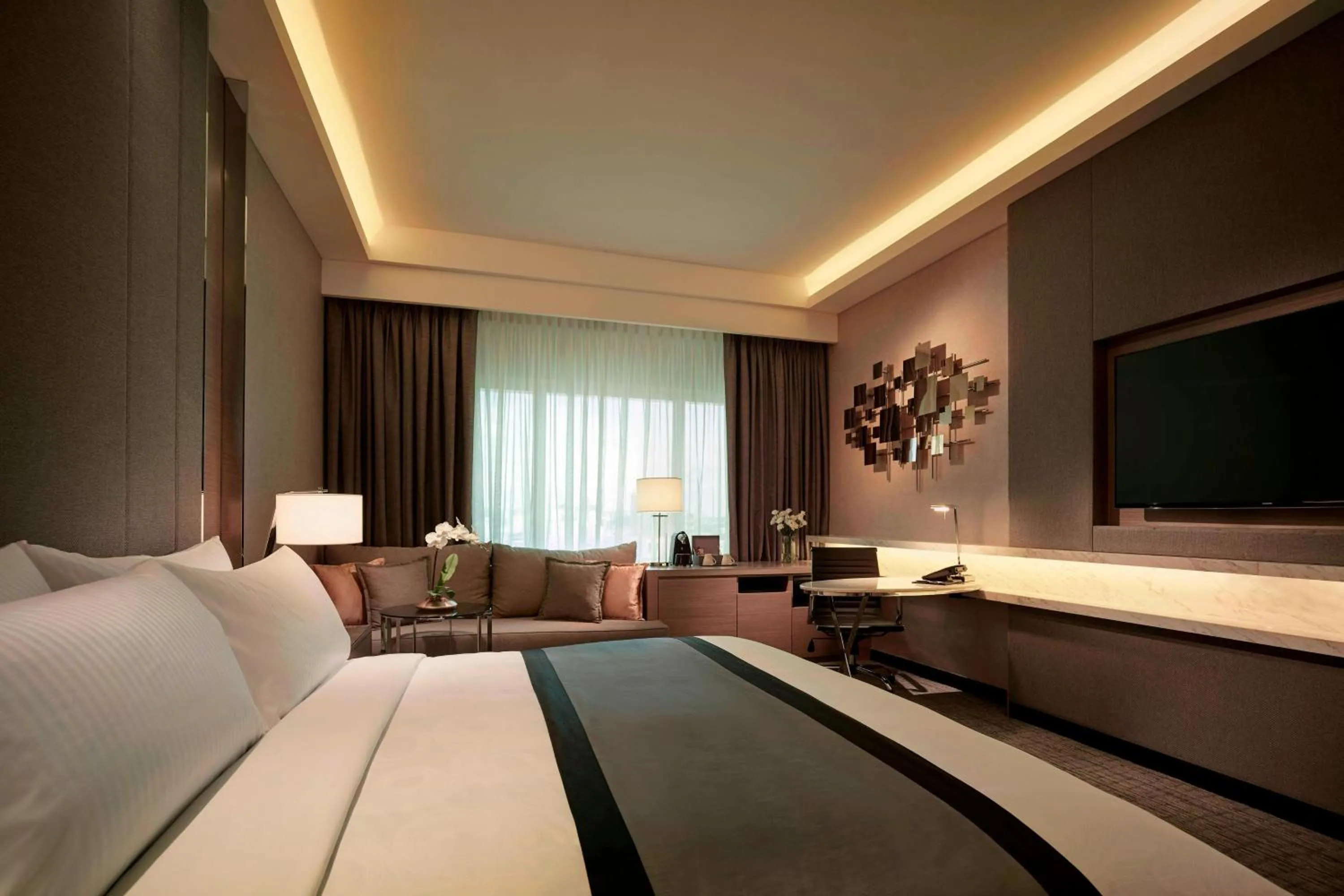 Photo of the whole room, Bed in JW Marriott Kuala Lumpur