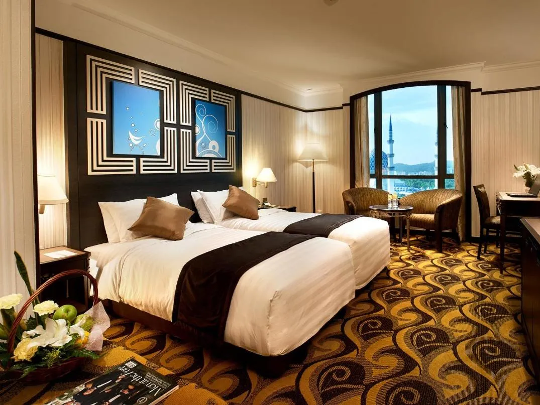 Bed in Mardhiyyah Hotel and Suites