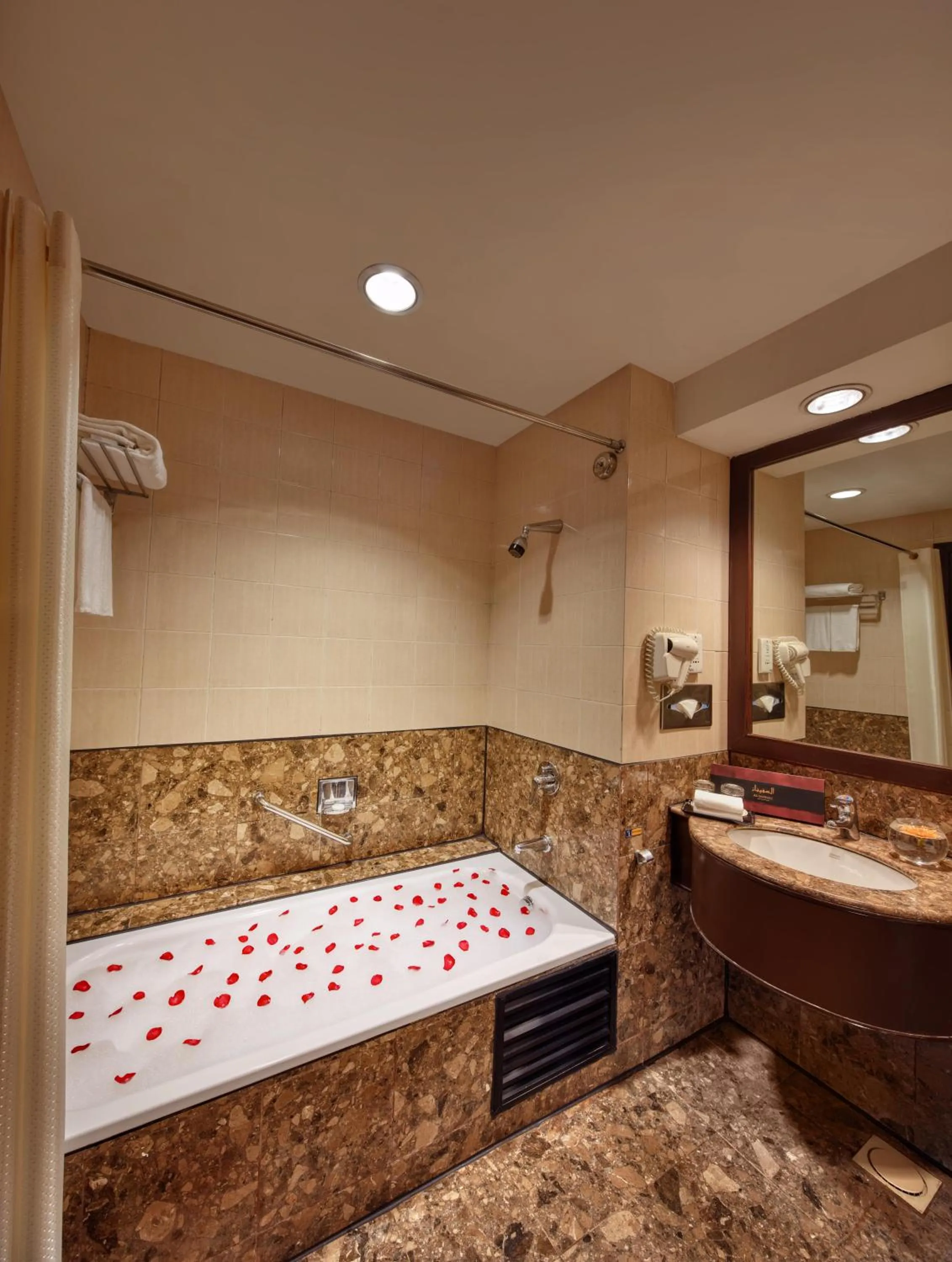 Bath, Bed in Mardhiyyah Hotel and Suites