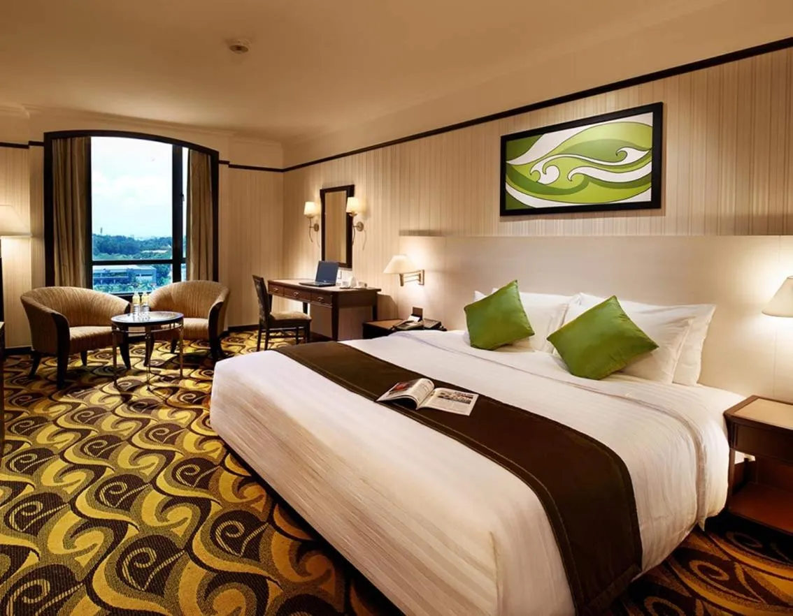 Photo of the whole room, Bed in Mardhiyyah Hotel and Suites