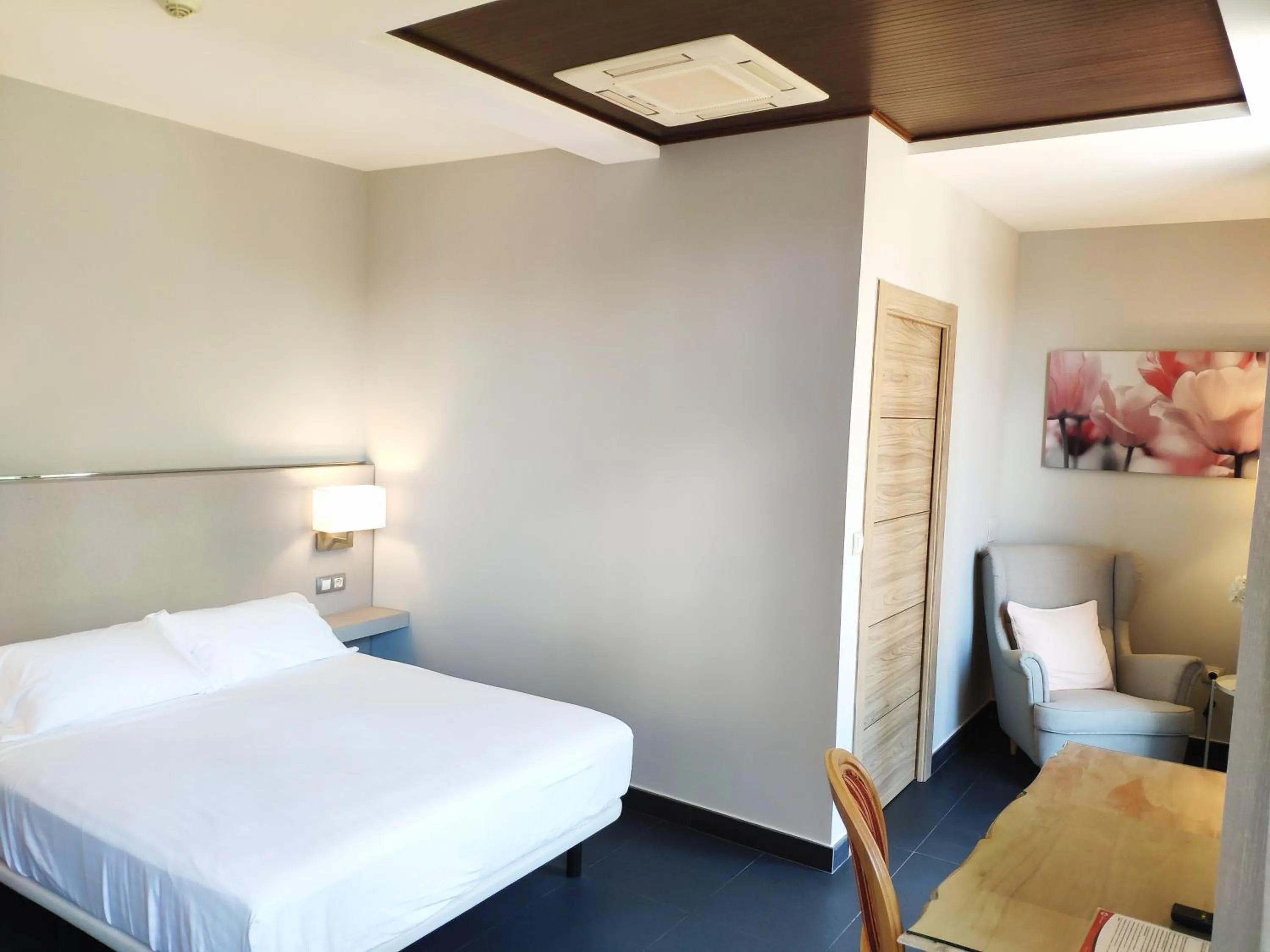 Bed in Hotel Puerta del Arco